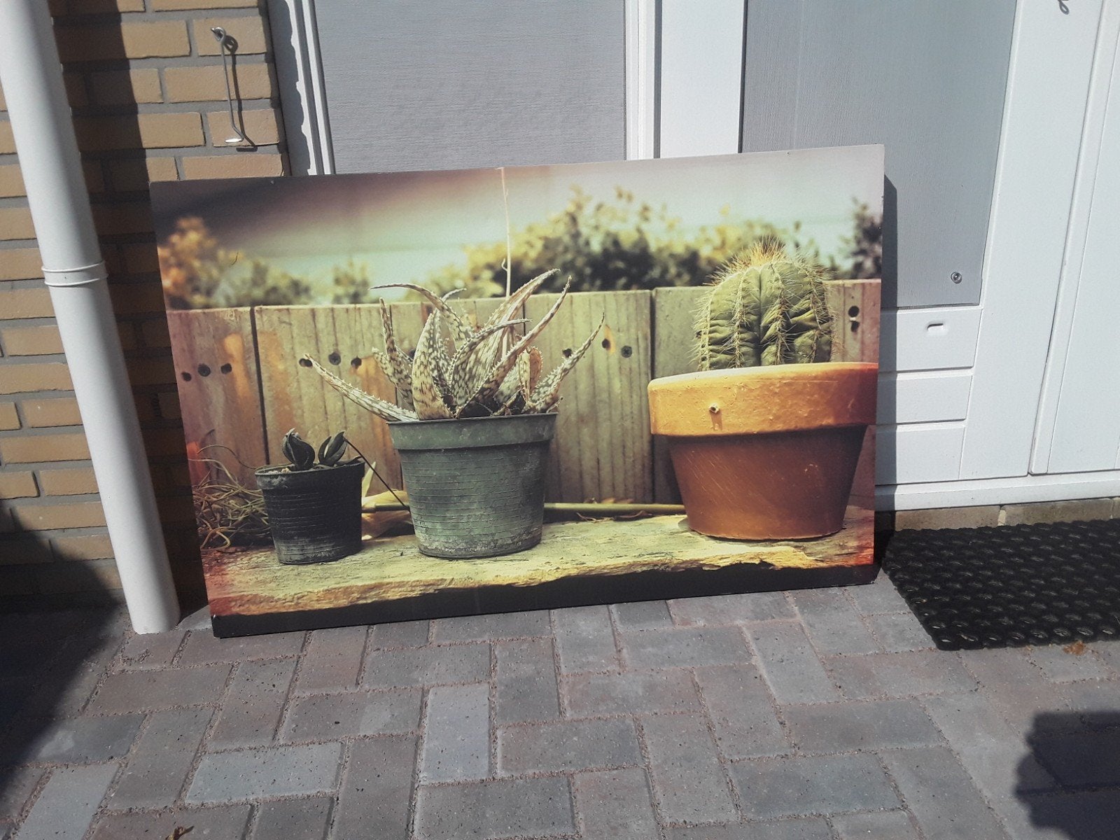 Groot schilderij, Tuin en Terras, Ophalen