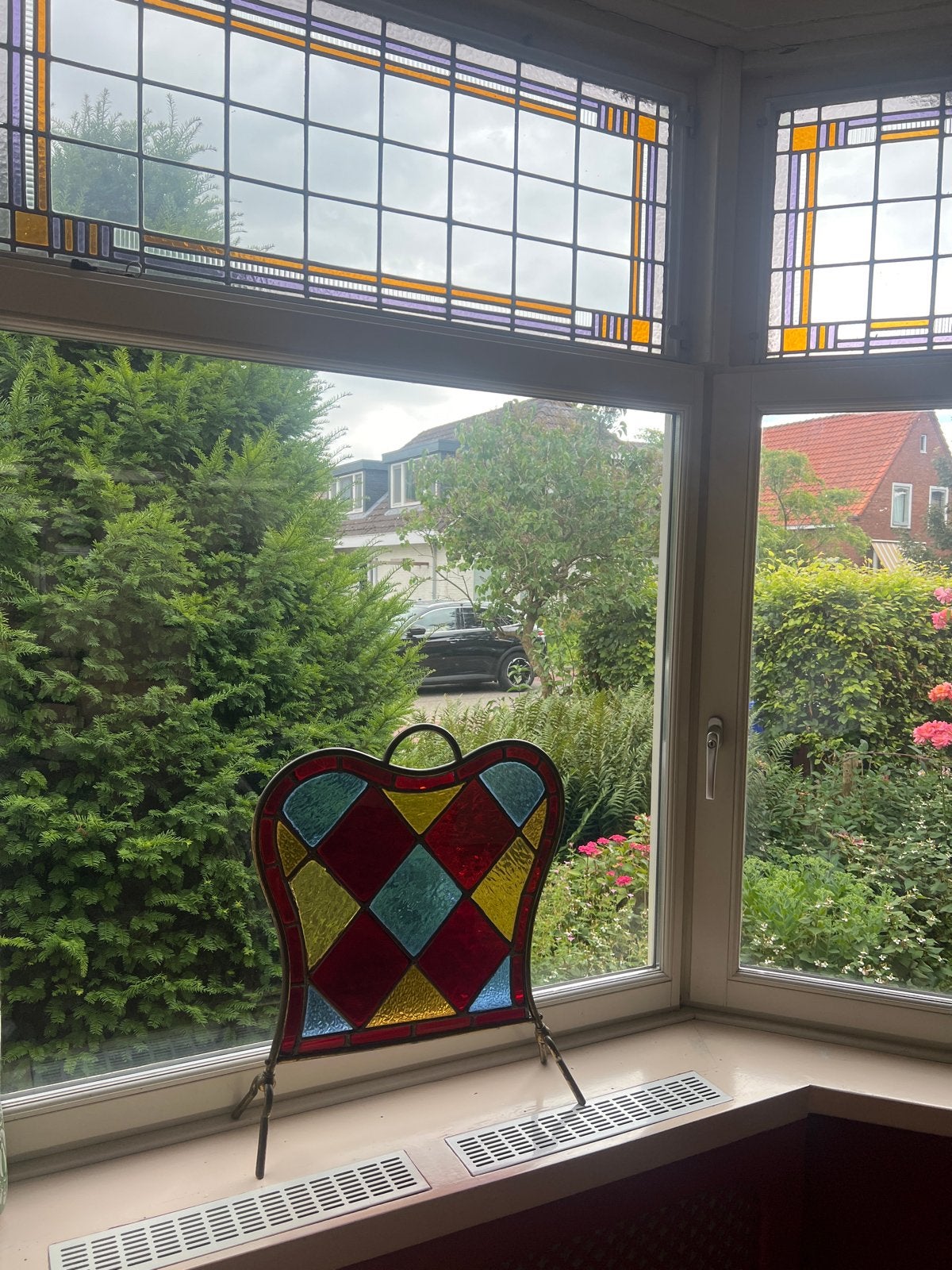 Glas in lood kunstwerk, Ophalen