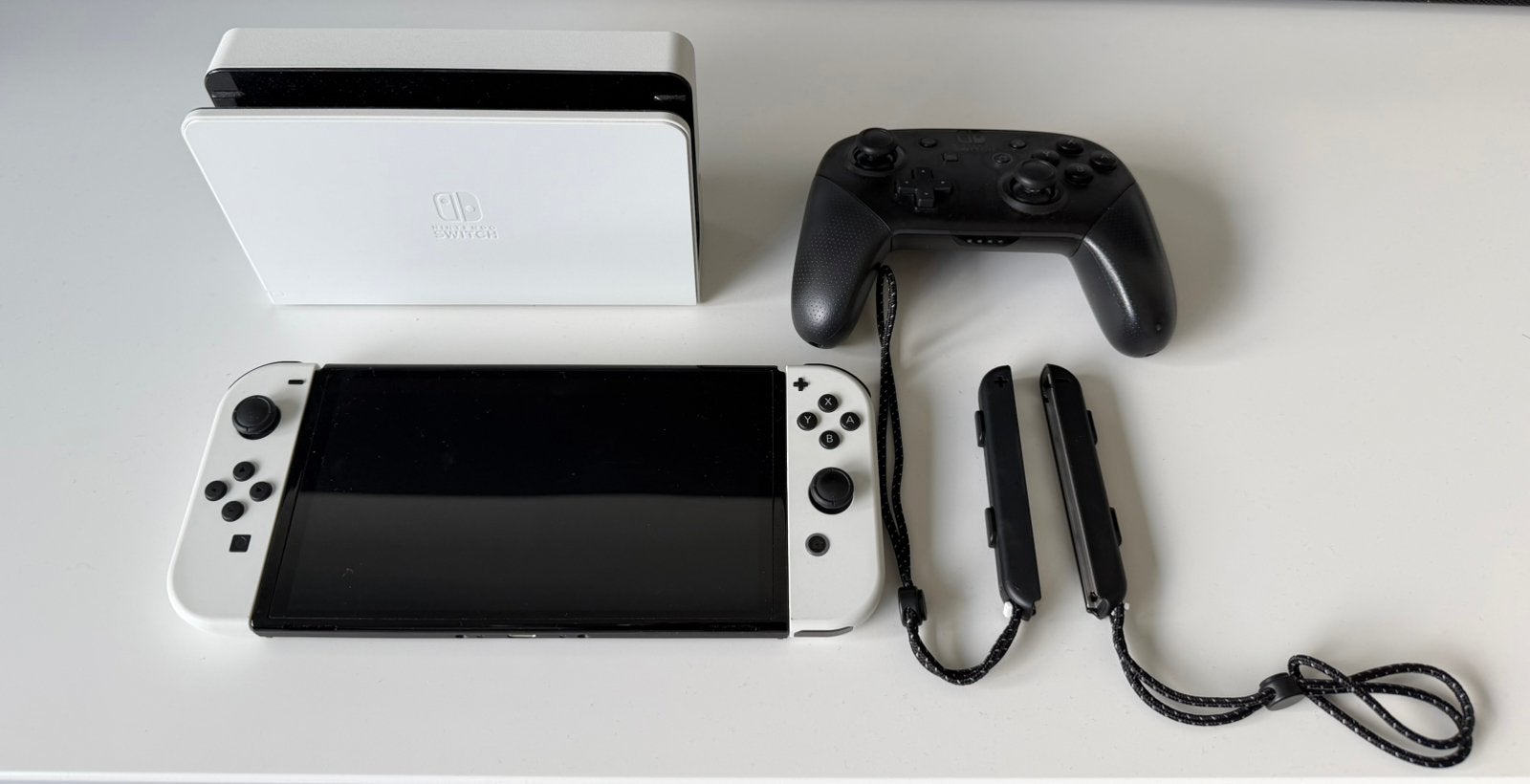 Nintendo Switch Oled met games en controller, Switch OLED, Met games, Ophalen of Verzenden, Zo goed als nieuw