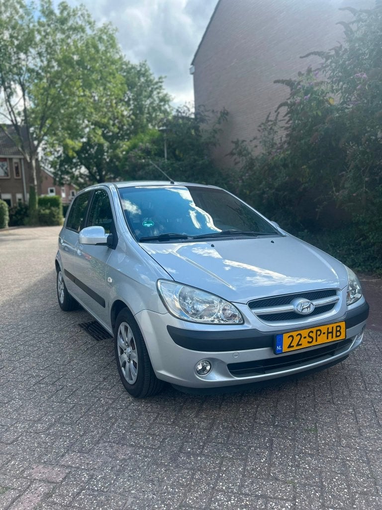 Hyundai Getz 1.4 5DRS 2006 Grijs - airco, Voorwielaandrijving, 40 €/maand, 4 cilinders, Origineel Nederlands
