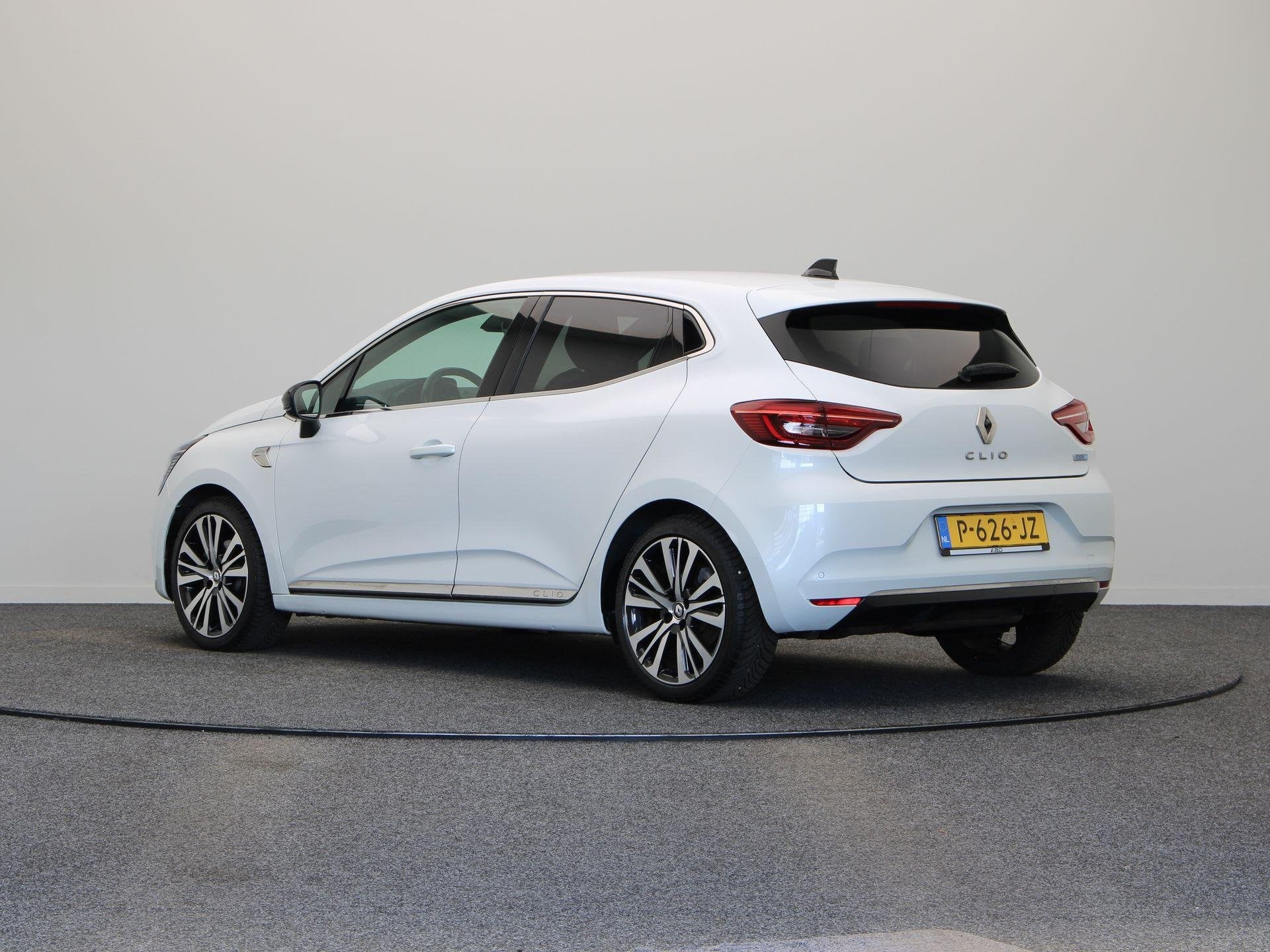 Renault Clio E-Tech Hybrid 140pk Initiale Paris | Stoel- en, Auto's, Dealer onderhouden, Gebruikt, Euro 6, 4 cilinders