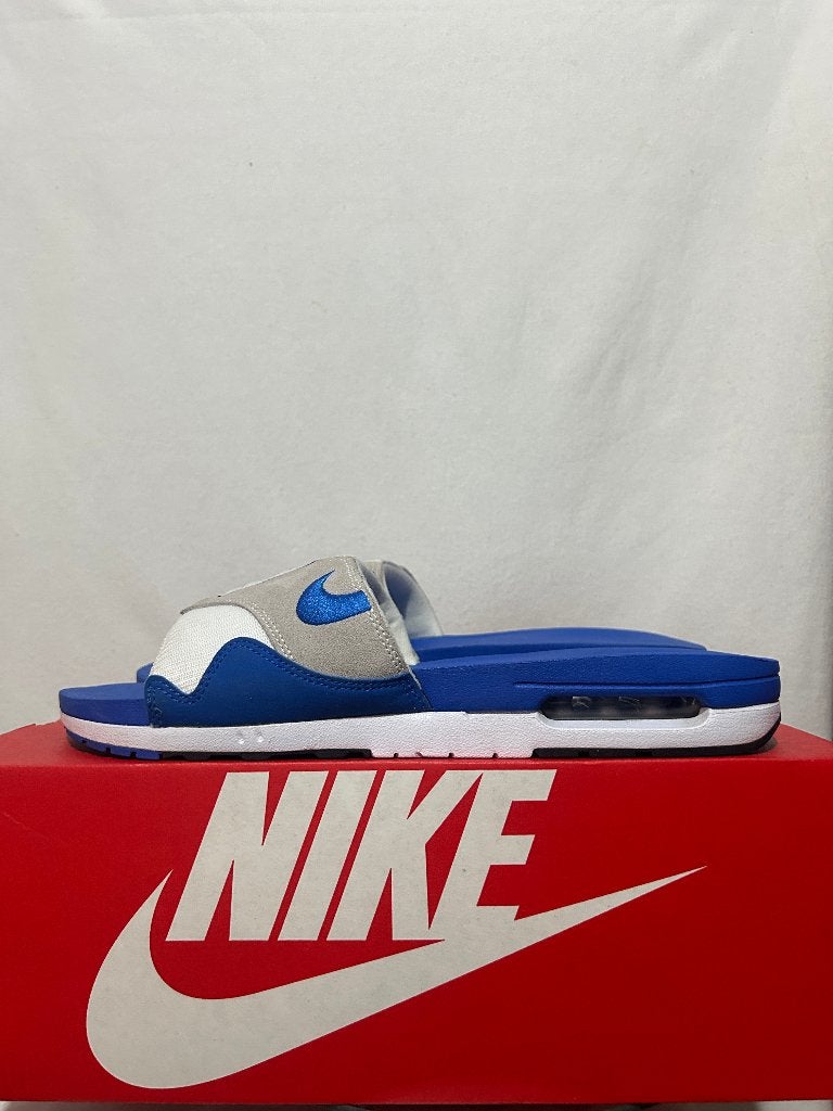 ALS NIEUW + DOOS Maat 49,5 - Nike Air Max 1 Slide Royal Blue, Slippers, Nike, Zo goed als nieuw, Nike
