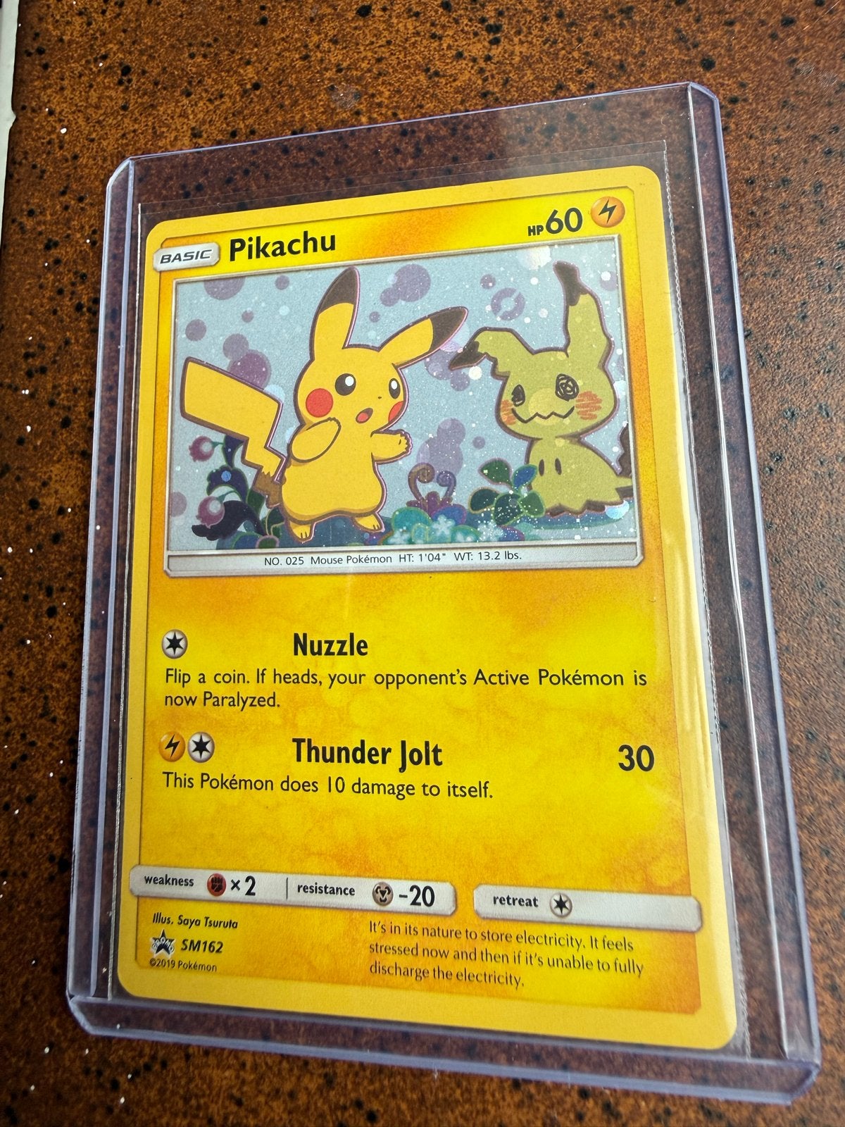 Pikachu & Mimikyu SM162 Promo Pokémon Kaart, Ophalen of Verzenden, Zo goed als nieuw, Losse kaart, Foil