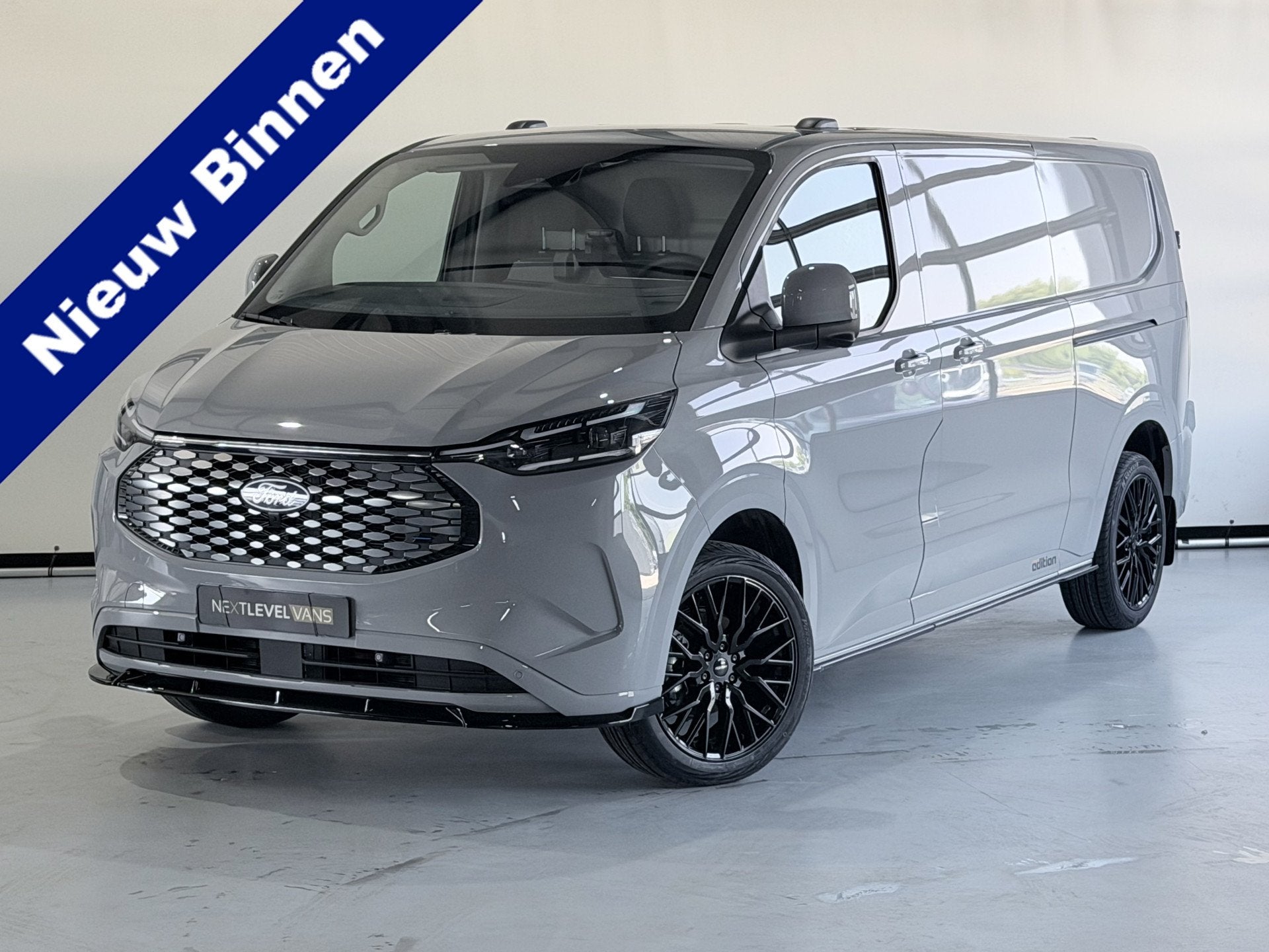 Ford Transit Custom E 71 kw L2/ H1 Limited Next Level Editio, Auto's, Bestelauto's, Automaat, Stof, Gebruikt, Origineel Nederlands