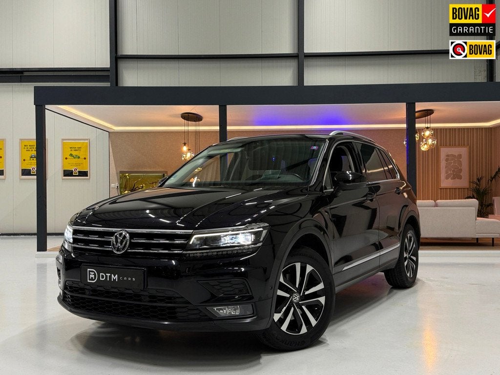 Volkswagen Tiguan 1.5 TSI line Business |Trekhaak|Dynaudio |, Auto's, Voorwielaandrijving, 4 cilinders, Leder en Stof, Zwart