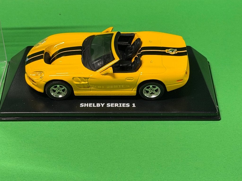 Shelby Series 1 geel modelauto 1:43, Overige merken, Gebruikt, Adres onbekend, Auto