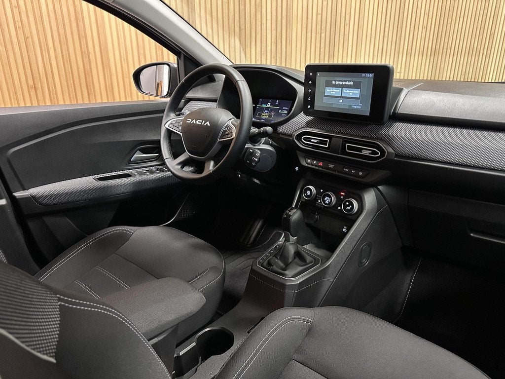 Dacia Jogger 1.6 Hybrid 140 Expression 7p. Camera | Carplay, Stof, Gebruikt, Euro 6, 4 cilinders
