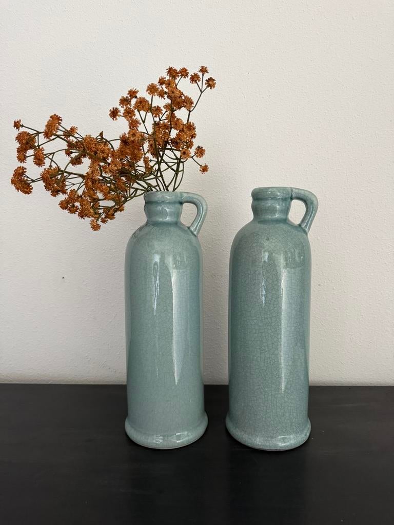 2 stuks BRYNXZ flessen licht blauw, Ophalen of Verzenden, Nieuw, Overige kleuren