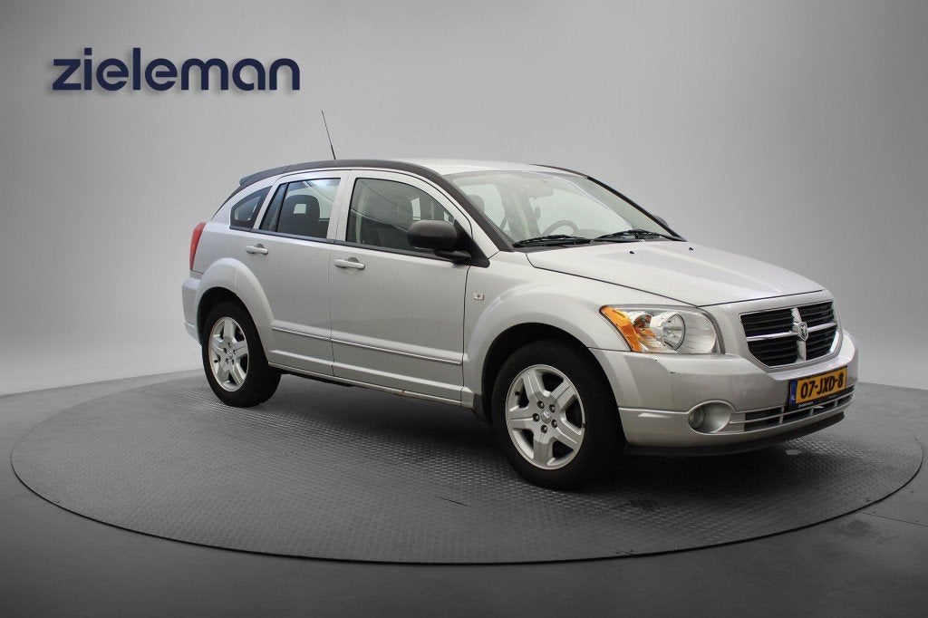 Dodge CALIBER 2.0 SE Auotomaat - Navi, Cruise, Trekhaak, Auto's, Dodge, Huisgarantie, Met garantie (alle), 2359 cc, 170 pk