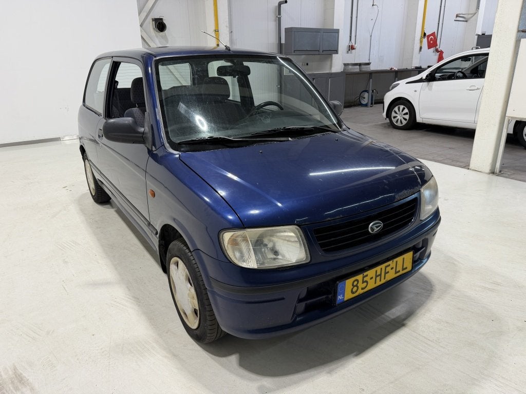 Daihatsu Cuore 1.0-12V RTi (bj 2001), Auto's, Voorwielaandrijving, Stof, Daihatsu, Origineel Nederlands