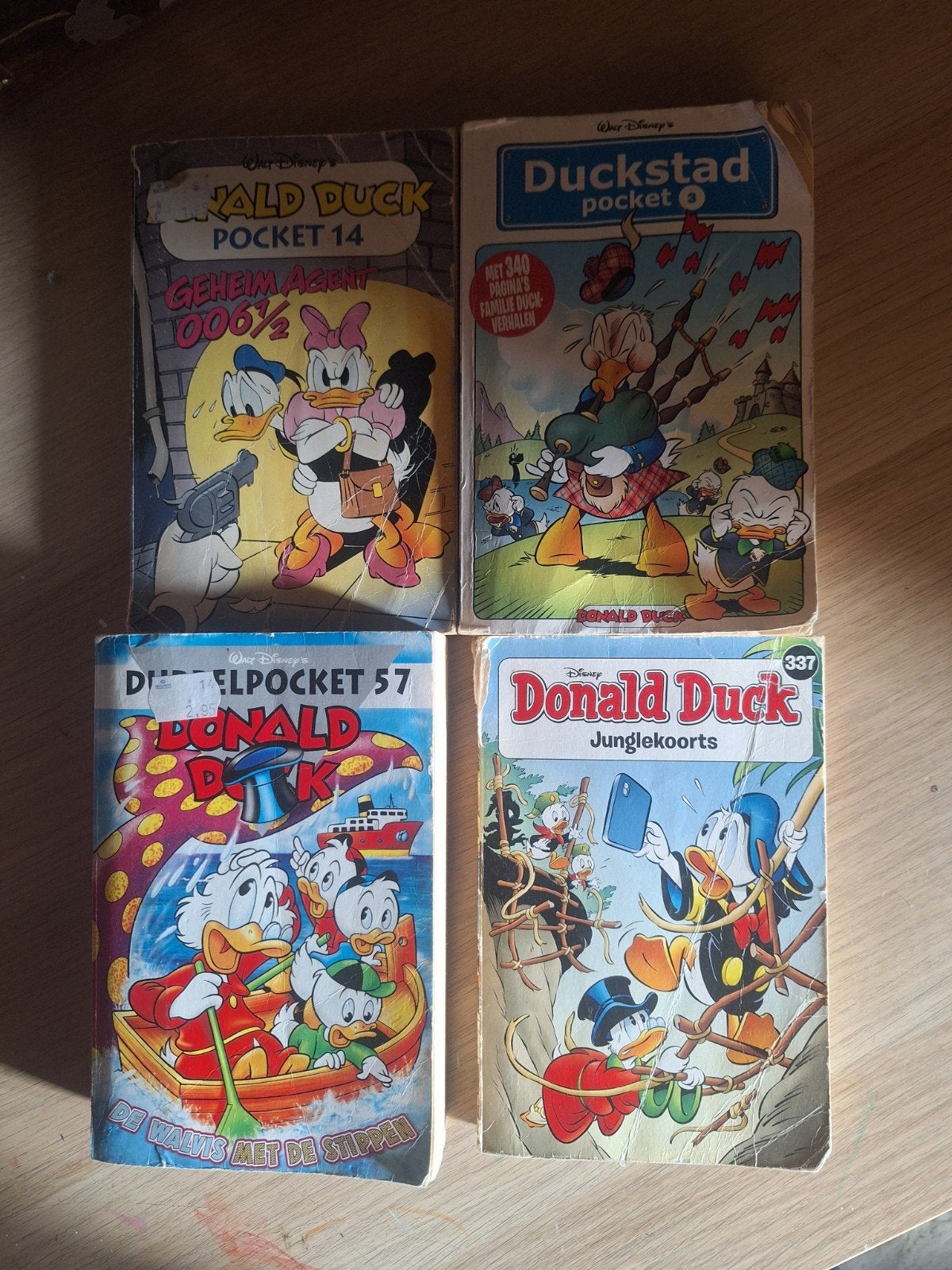 Donald Duck en Duckstad pockets - 4 stuks, Gelezen, Walt Disney, Ophalen of Verzenden, Meerdere stripboeken