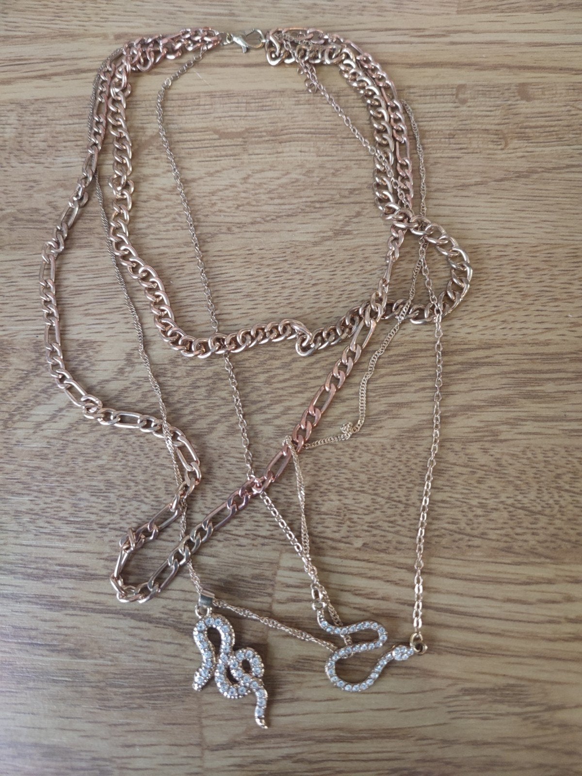 Goudkleurige kettingen met slang hangers, Overige materialen, Gebruikt, Met hanger, Ophalen of Verzenden