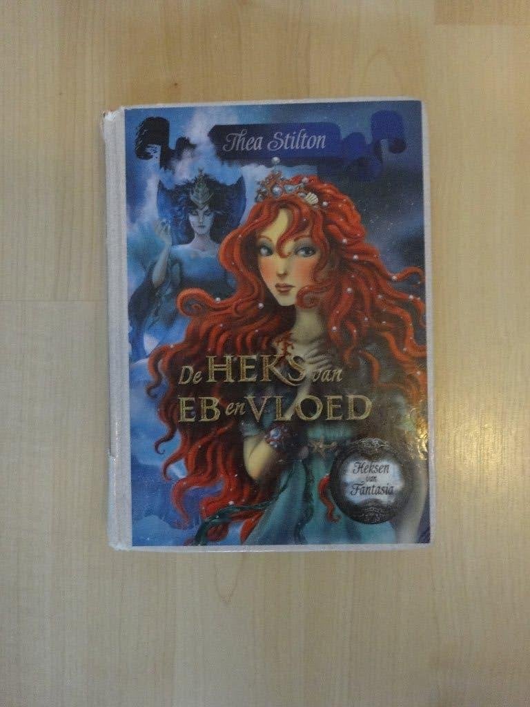 De heks van Eb en Vloed – Thea Stilton, Ophalen of Verzenden, Gelezen