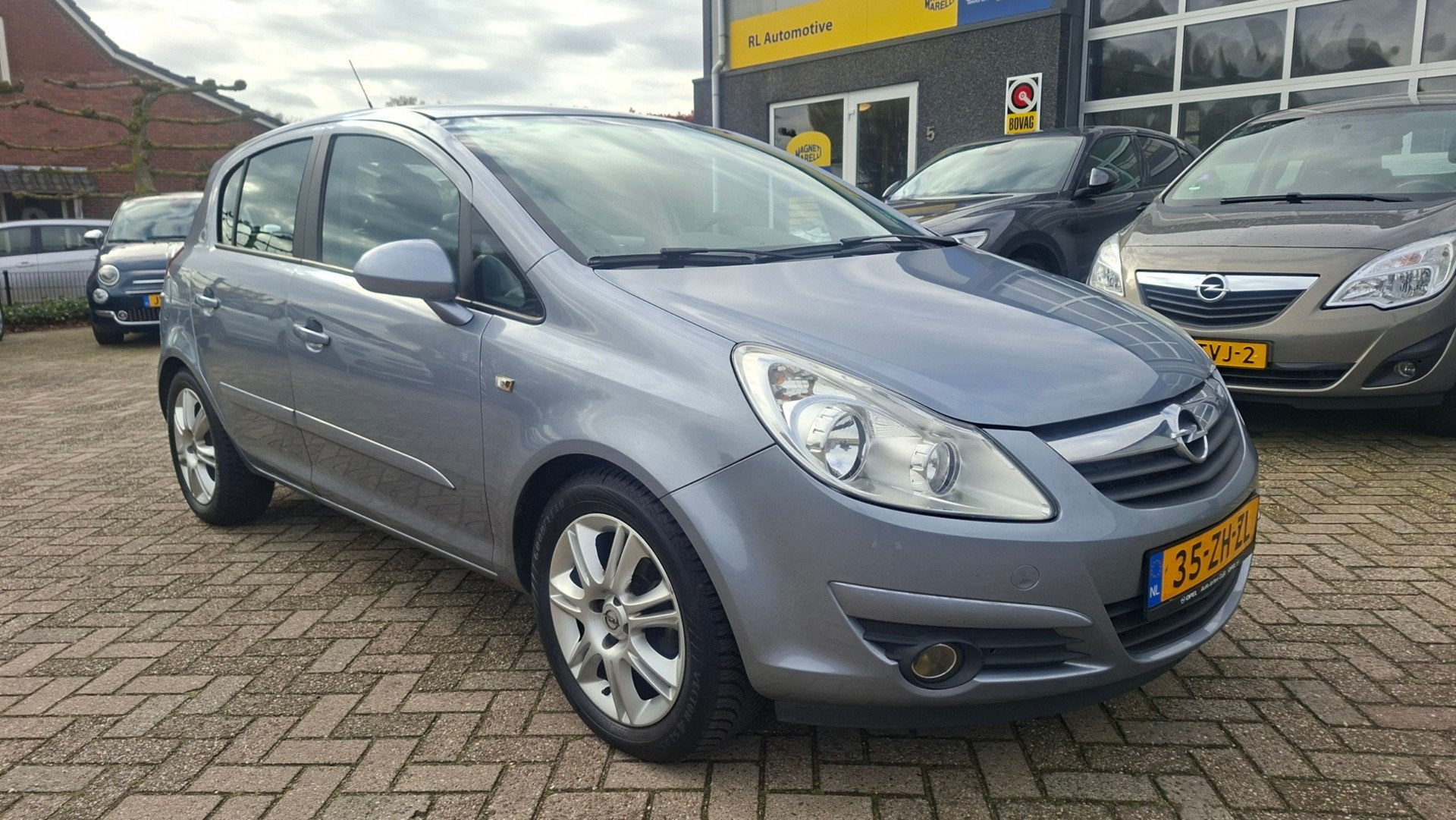 Opel Corsa 1.2-16V Cosmo - Airco - Ingebouwde fietsendrager, Auto's, Opel, Voorwielaandrijving, Stof, Gebruikt, 4 cilinders