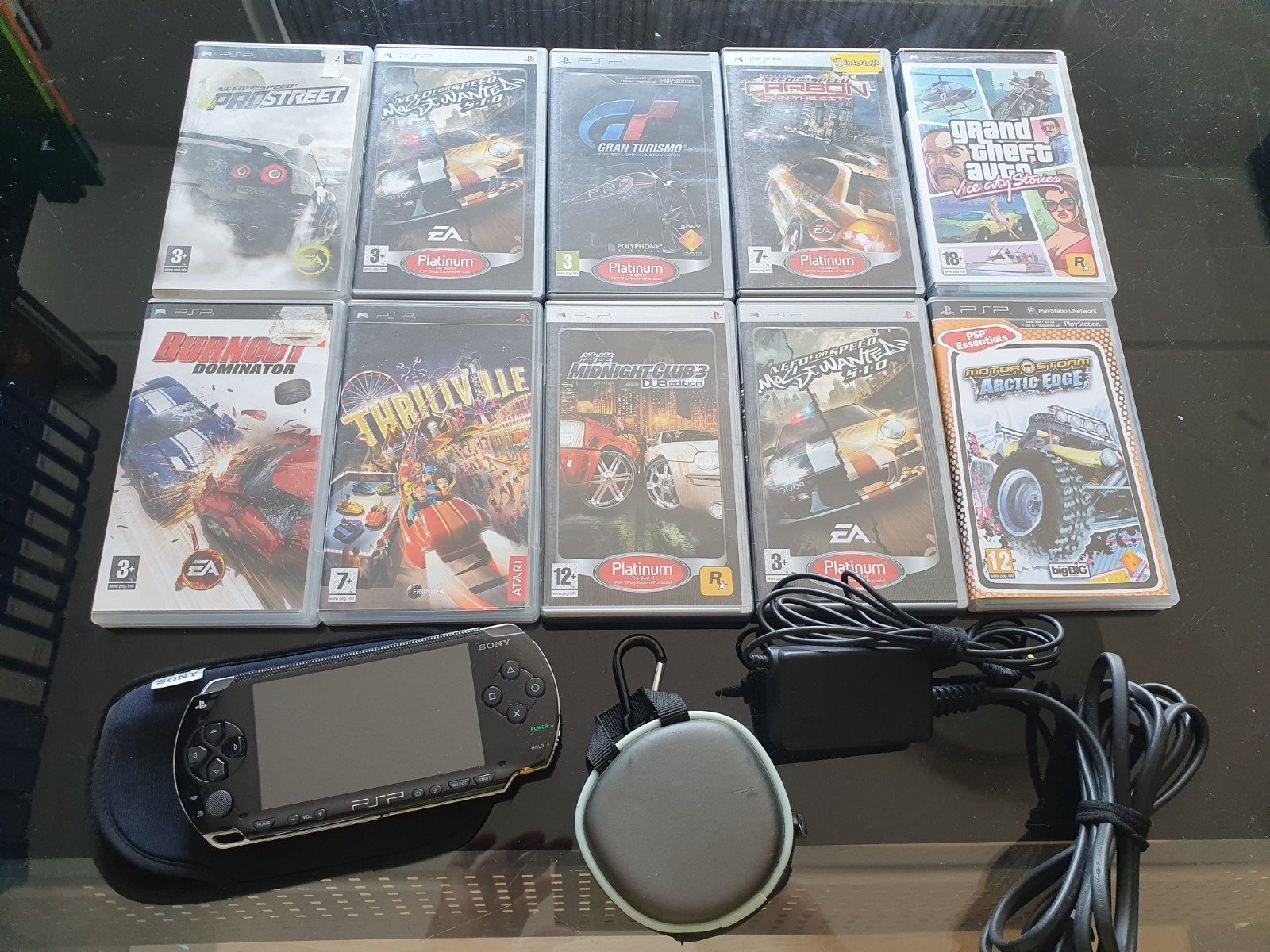 PSP 1004 + 10 top games, Met games, Zwart, Ophalen of Verzenden, Zo goed als nieuw