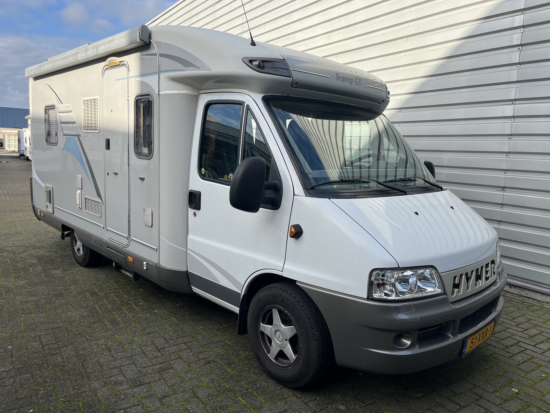 Hymer Tramp 574 GT 2.8 jTD nieuwe AIRCO (bj 2005), Caravans en Kamperen, Bedrijf, Hymer, 5 tot 6 meter, 5 tot 6 meter