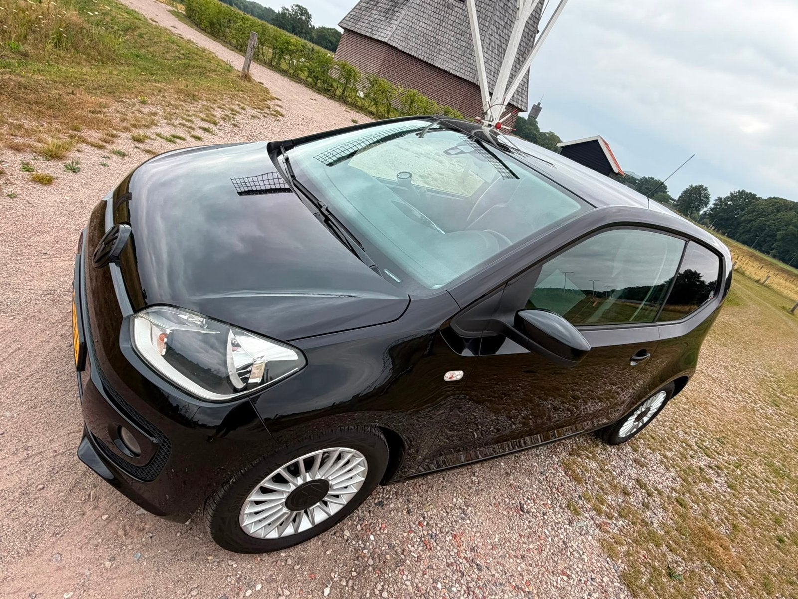 Volkswagen up! 1.0 44KW 2012 Zwart, Auto's, Voorwielaandrijving, Stof, 840 kg, 4 stoelen