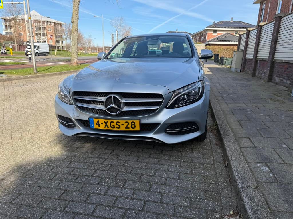 Mercedes-Benz C-Klasse C180 1.6 115KW Aut7 2014 Grijs, Automaat, 1800 kg, Zwart, Leder en Stof