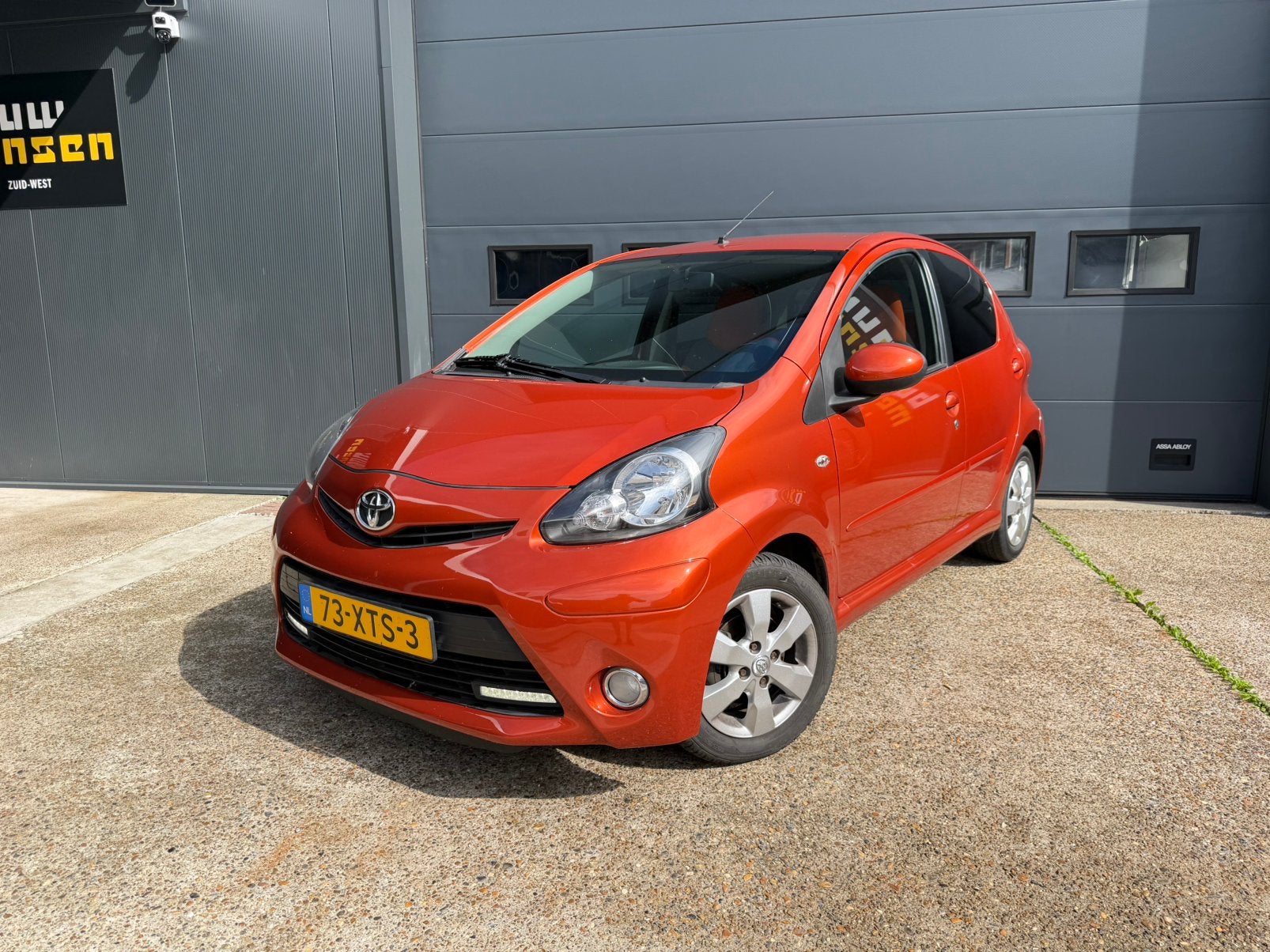 Toyota Aygo 1.0 12V Vvt-i 5DRS 2012 Dynamic Orange Airco Apk, Auto's, Voorwielaandrijving, Dealer onderhouden, Stof, Overige kleuren