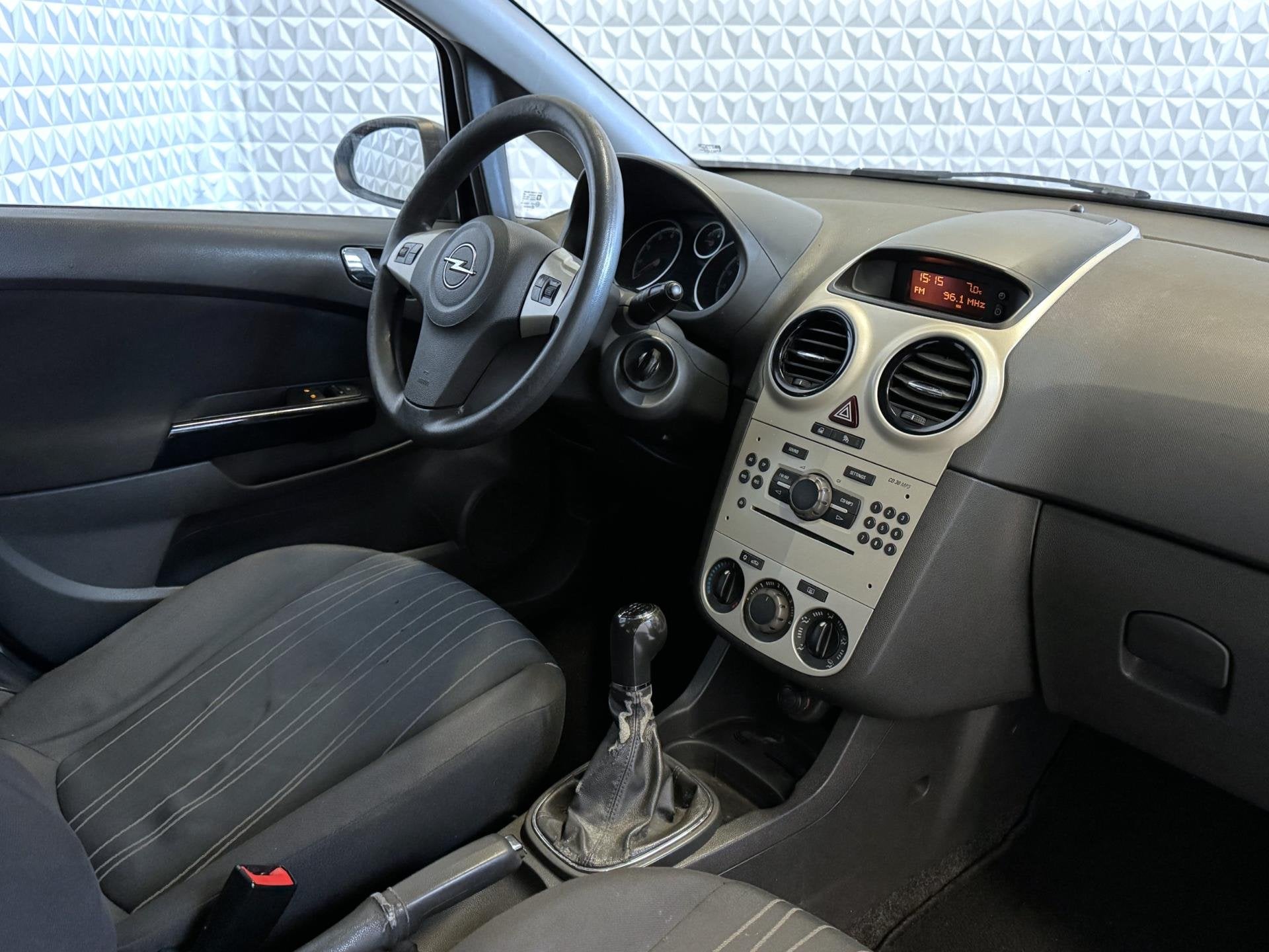 Opel Corsa 1.2-16V Enjoy 5drs AIRCO - Koppakking lek?! (2008, Auto's, Voorwielaandrijving, Stof, Zwart, 4 cilinders