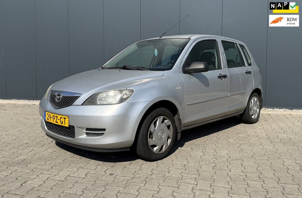 Mazda 2 1.4 Exclusive Airco Trekhaak Handel of Export, Voorwielaandrijving, 1025 kg, Zwart, 4 cilinders