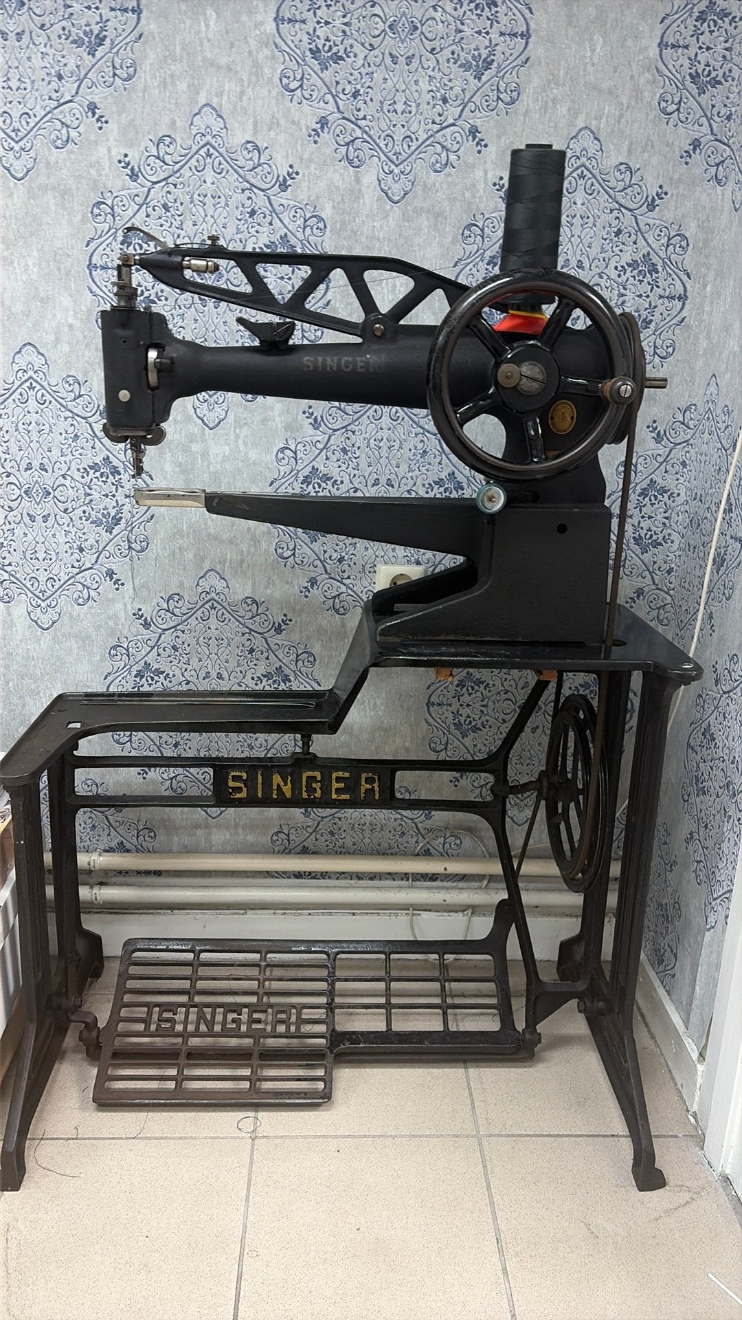 Antieke Singer 29K73, Ophalen