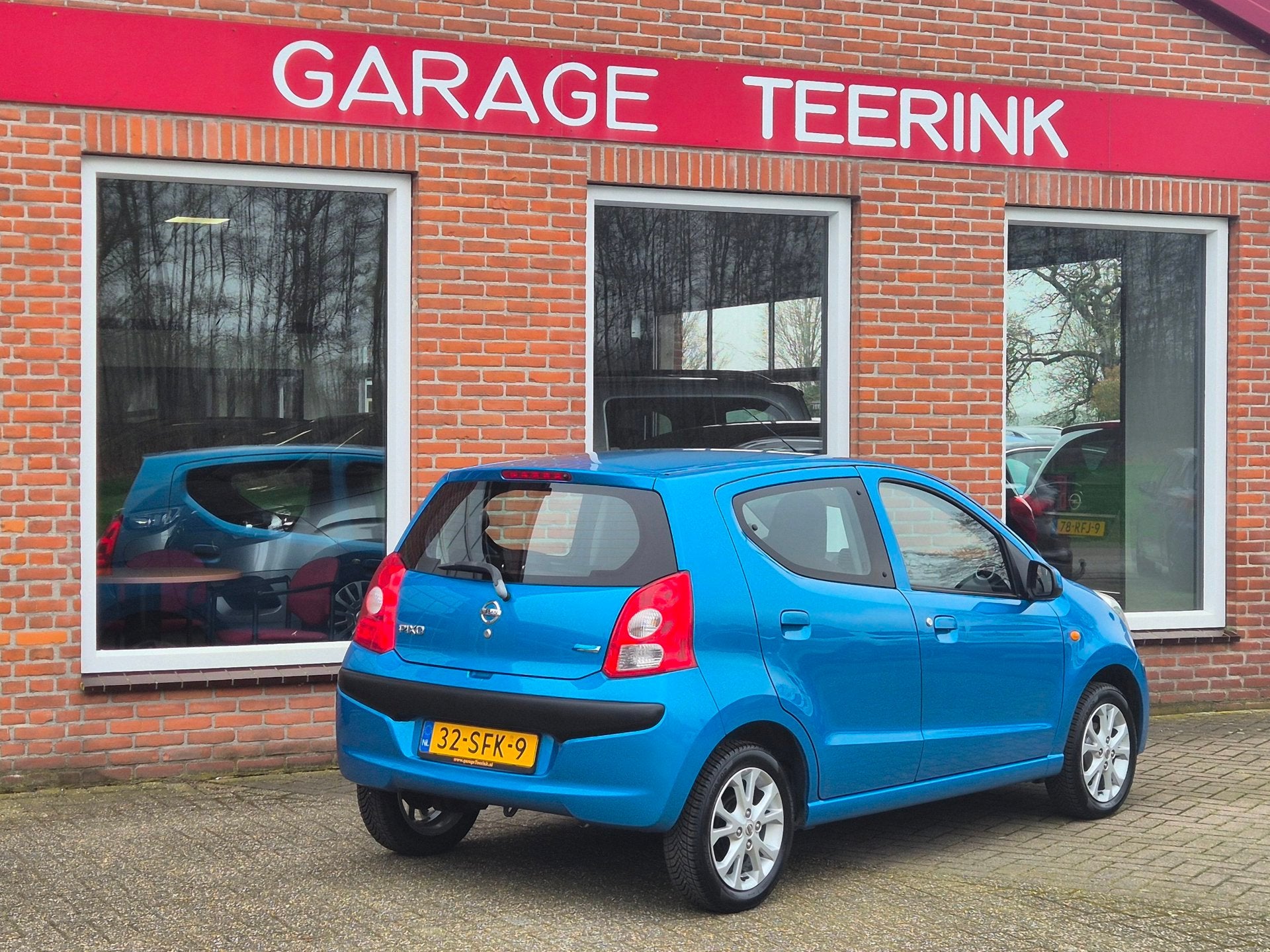 Nissan Pixo 1.0 Acenta 68PK 5drs airco, elektr.ramen, stuurb, Auto's, Nissan, Voorwielaandrijving, Euro 5, Stof, Gebruikt
