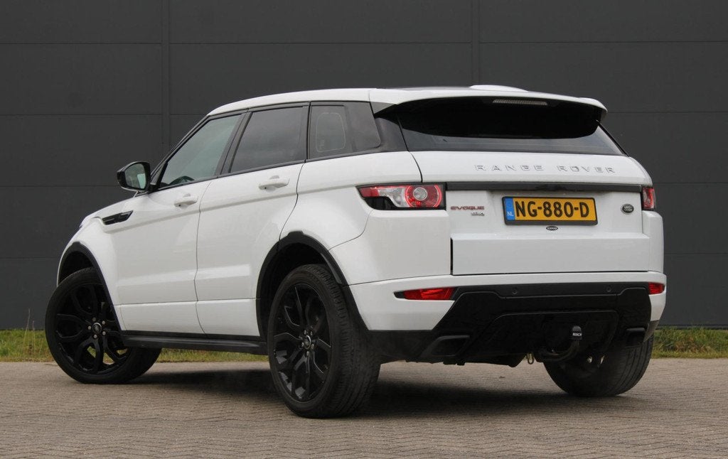 Land Rover Range Rover Evoque 2.0 Si 4WD Prestige Meridian P, Auto's, Land Rover, Euro 5, Zwart, 4 cilinders, Wit