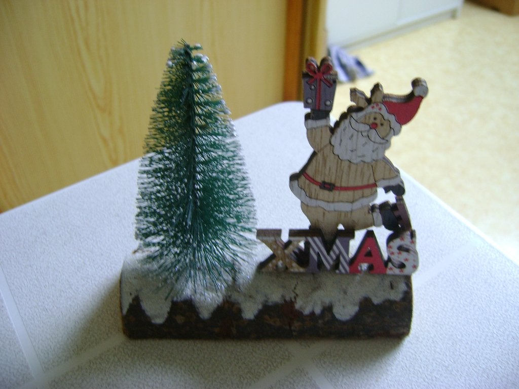 houten boomstam met kerstman op schaatsen enkerstboom 12hx11, Ophalen of Verzenden, Zo goed als nieuw
