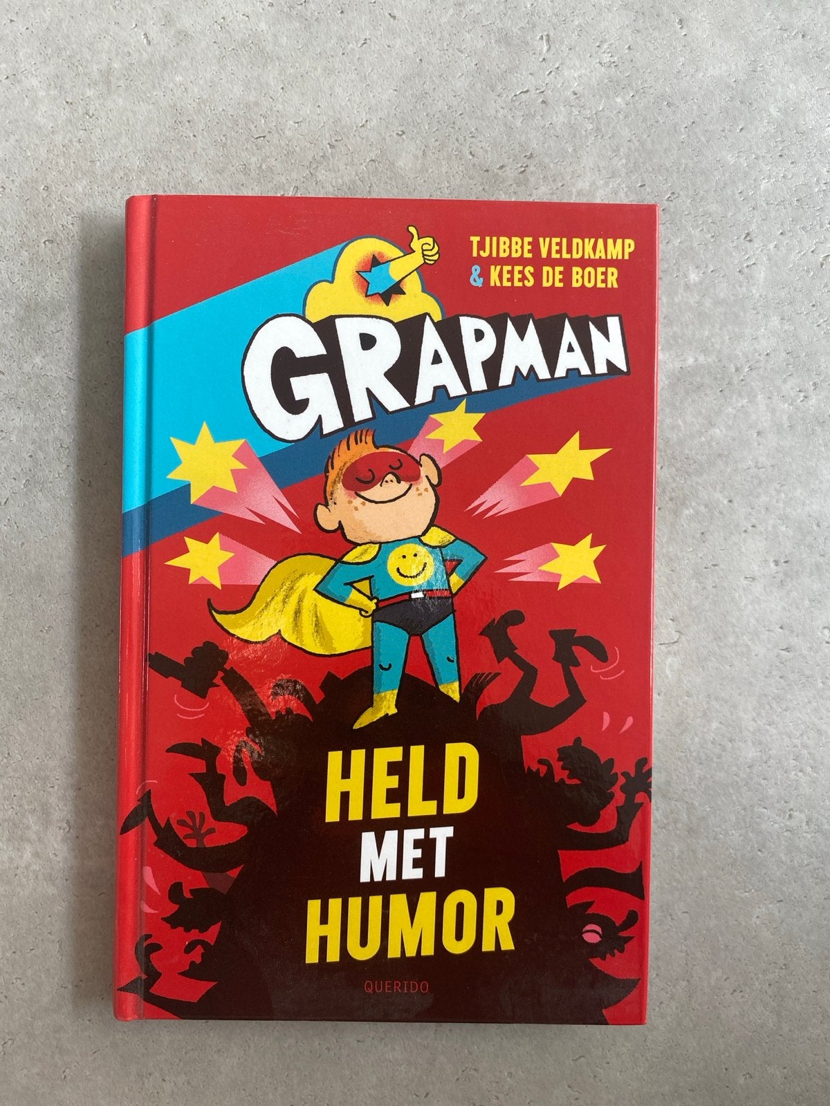 Grapman: Held met Humor - Tjibbe Veldkamp & Kees de Boer, Ophalen of Verzenden, Zo goed als nieuw, Fictie