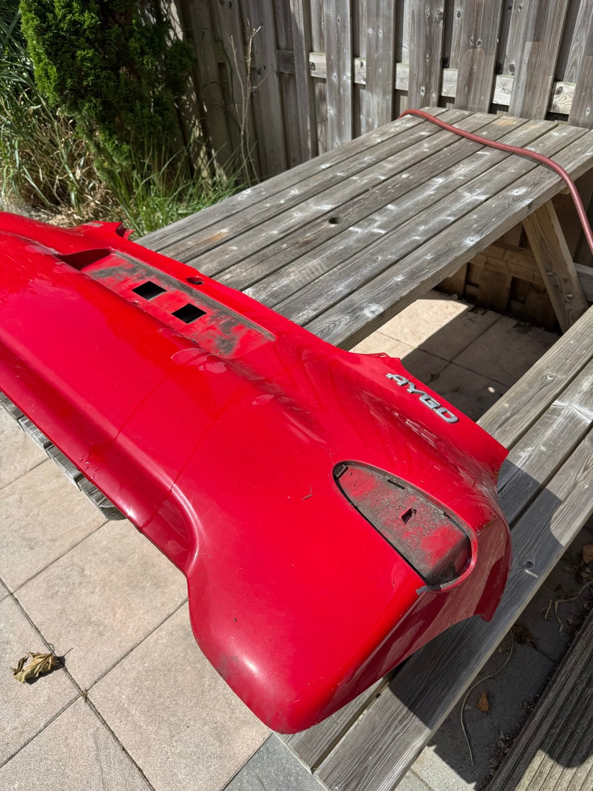 Toyota Aygo 2009 achterbumper rood, Auto-onderdelen, Ophalen, Gebruikt, Toyota, Achter