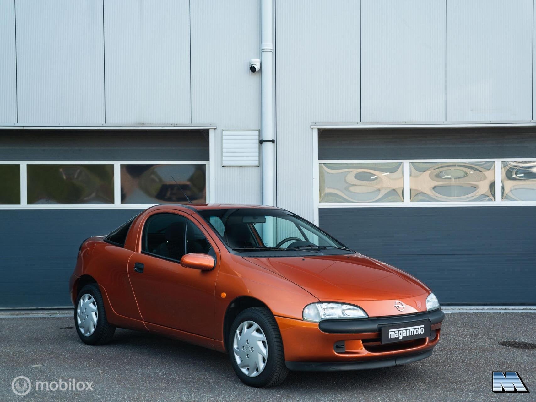 Opel Tigra 1.4i-16V | 1e eign. | Apache Metallic | ZGAN, Auto's, Opel, Voorwielaandrijving, Stof, Gebruikt, Zwart