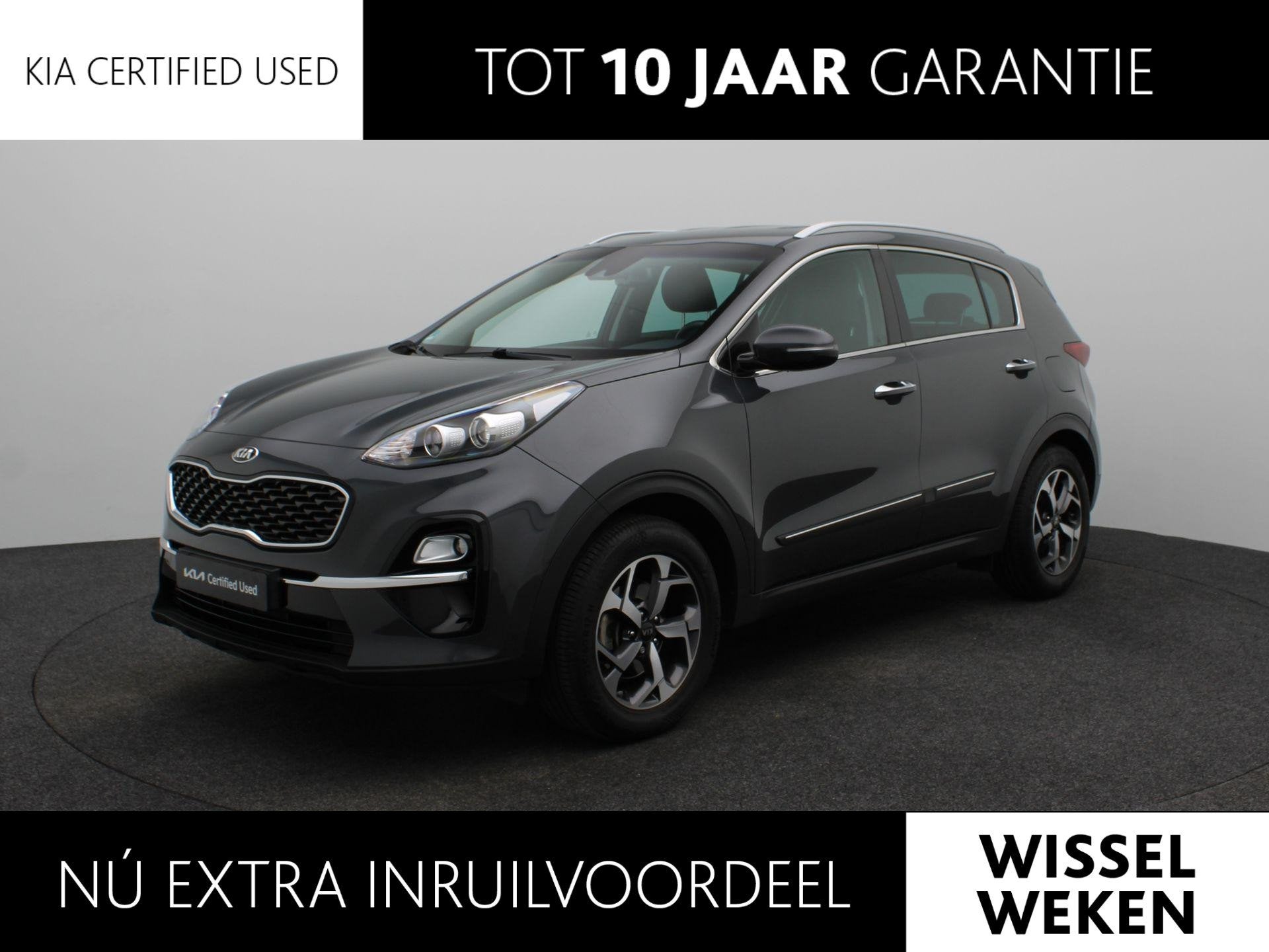 Kia Sportage 1.6 T-GDI DynamicLine | Leer | Trekhaak | Airco, Auto's, Stof, Gebruikt, 4 cilinders, 1445 kg