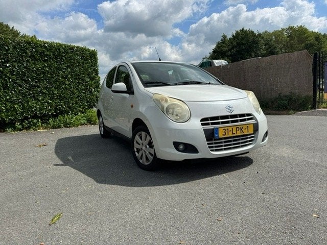 Suzuki Alto 1.0 2010 Wit, Voorwielaandrijving, Stof, 4 stoelen, Origineel Nederlands