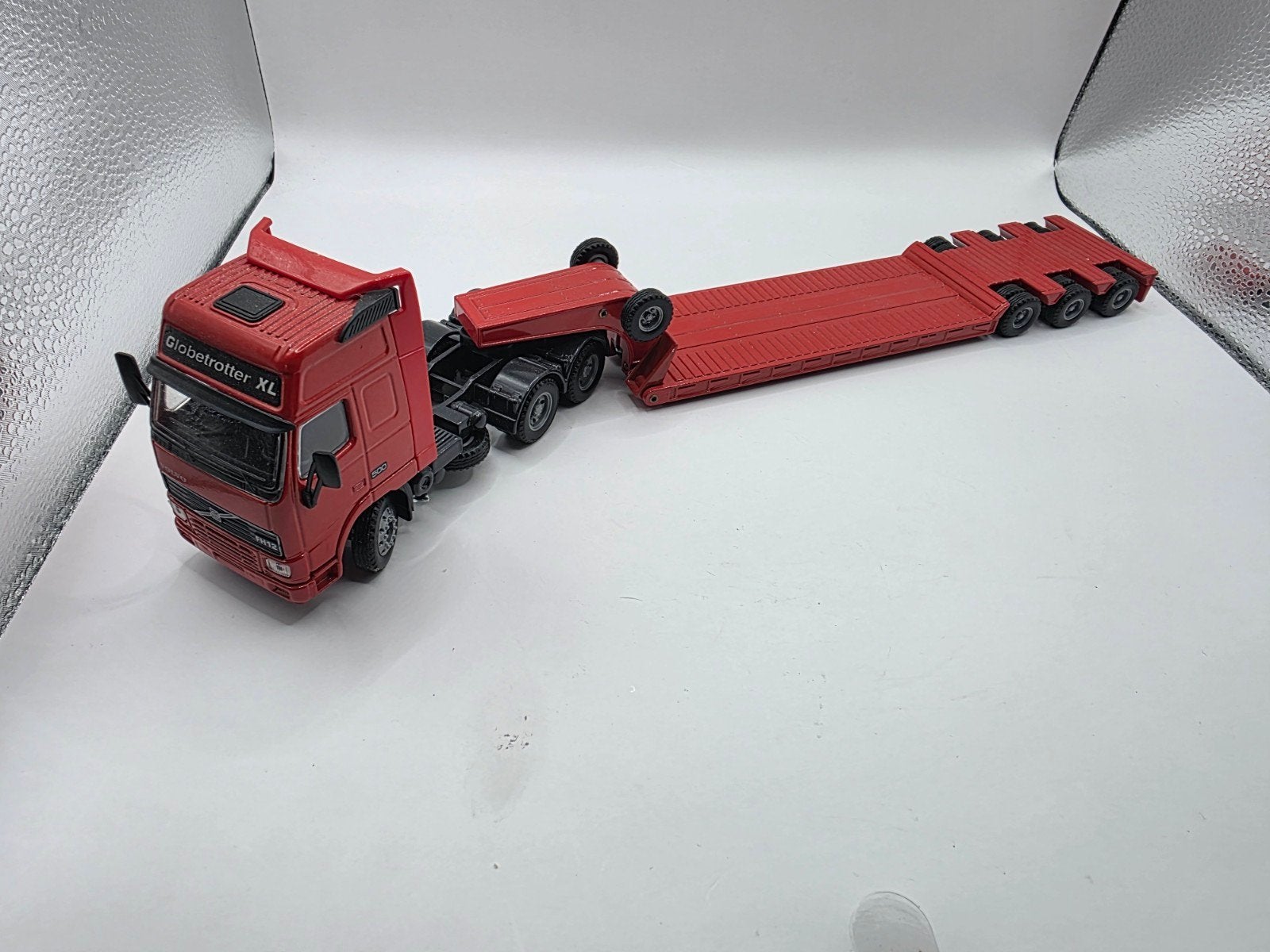 Volvo fh 12 globetrotter xl, Hobby en Vrije tijd, Modelauto's | 1:50, Zo goed als nieuw, Bus of Vrachtwagen, Wsi, Ophalen of Verzenden