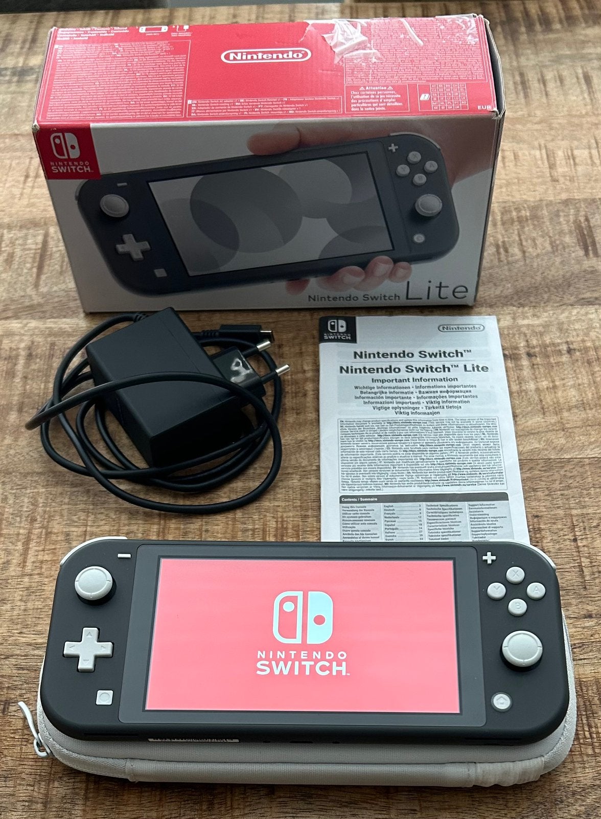 Nintendo switch lite grijs met lader en doos, Ophalen, Grijs, Zo goed als nieuw