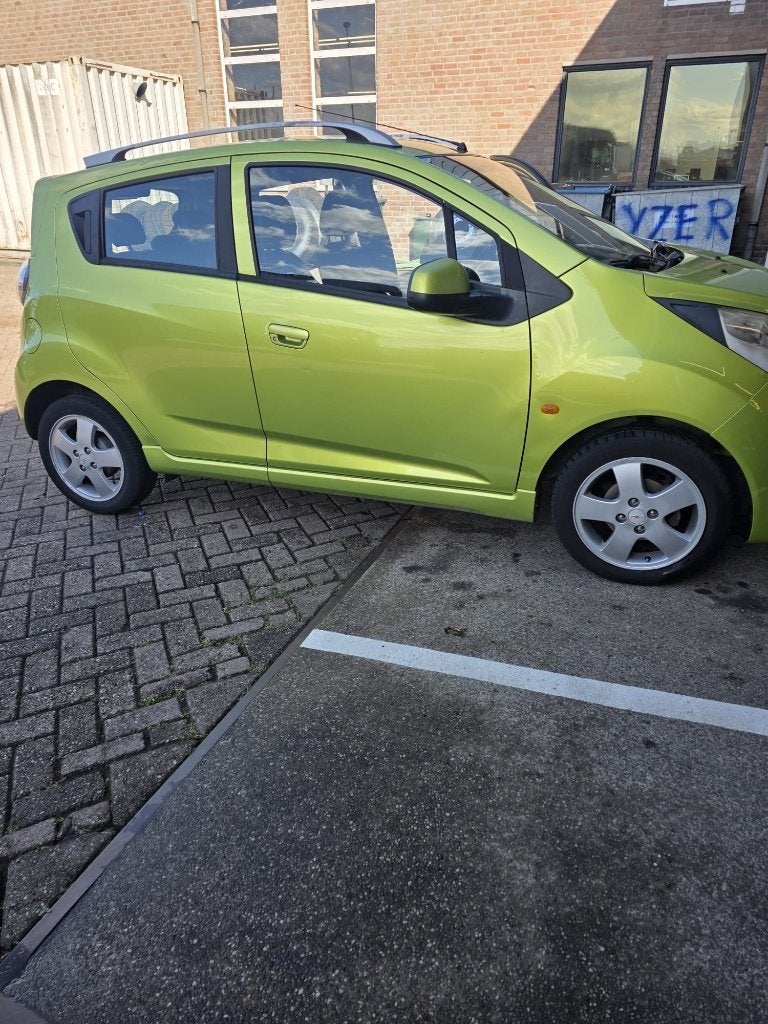 Chevrolet Spark 1.2 2010 Groen, Auto's, Voorwielaandrijving, Stof, Origineel Nederlands, Grijs
