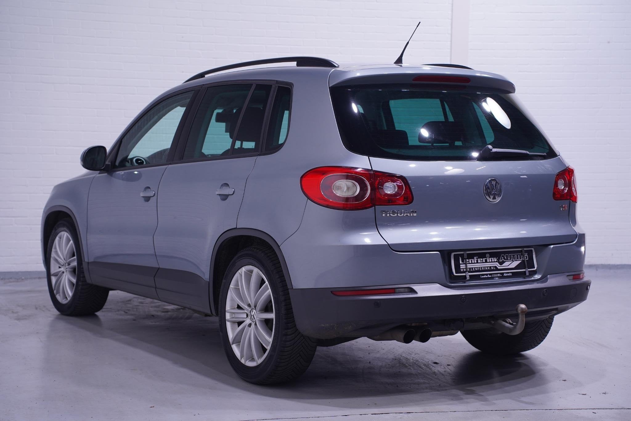 Volkswagen Tiguan 1.4 TSI Trend&Fun 4Motion Clima PDC v+a St, Auto's, Stof, Gebruikt, Zwart, 4 cilinders