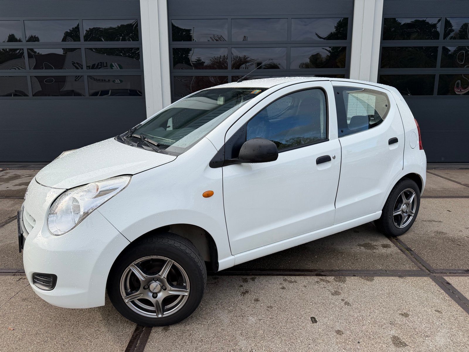 Suzuki Alto 1.0 2010 Wit, Voorwielaandrijving, Stof, 4 stoelen, Handgeschakeld