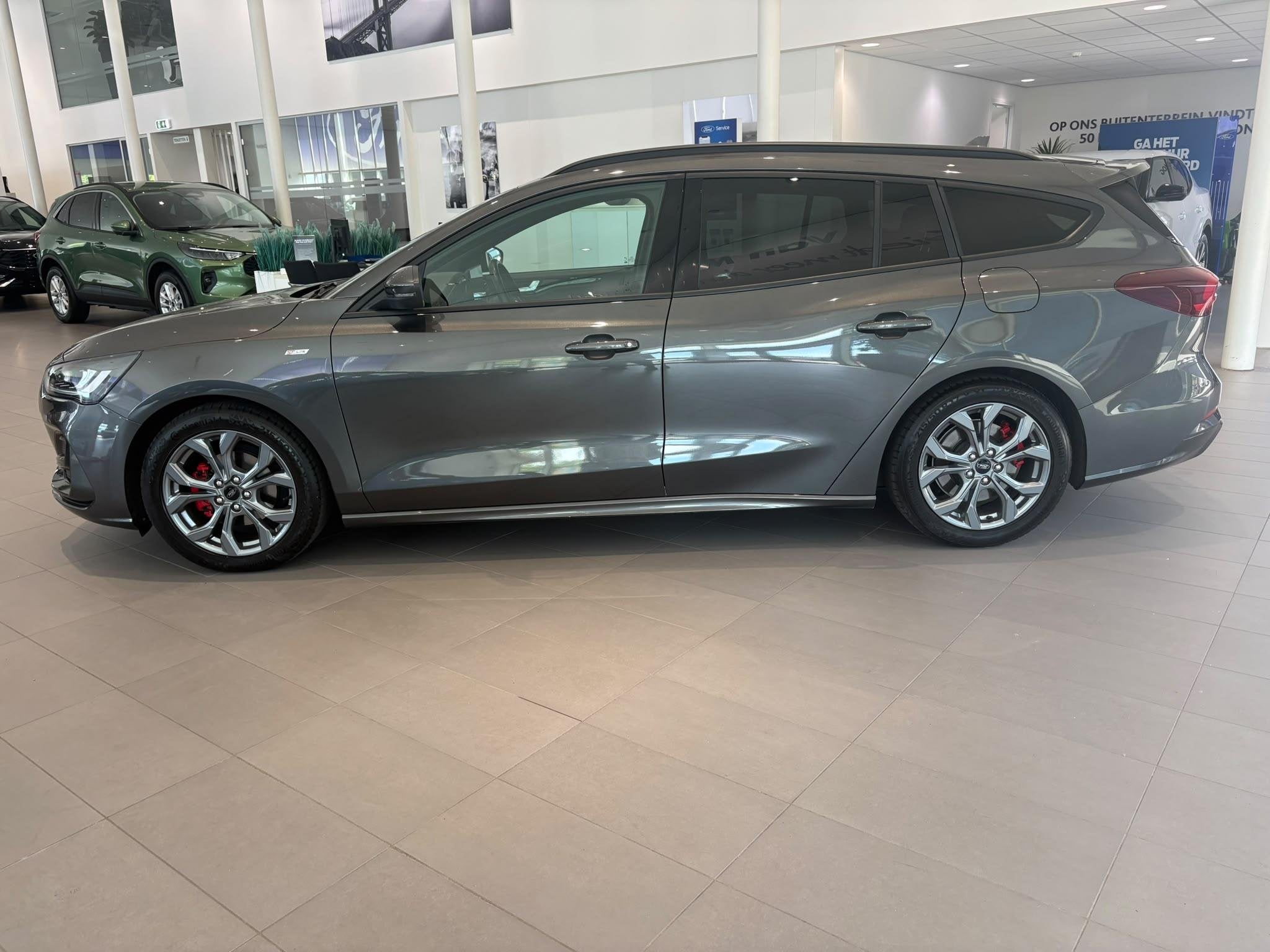 Ford Focus Wagon 1.0 EcoBoost Hybrid ST Line X TREKHAAK | B&, 12 maanden, Stof, Gebruikt, Euro 6
