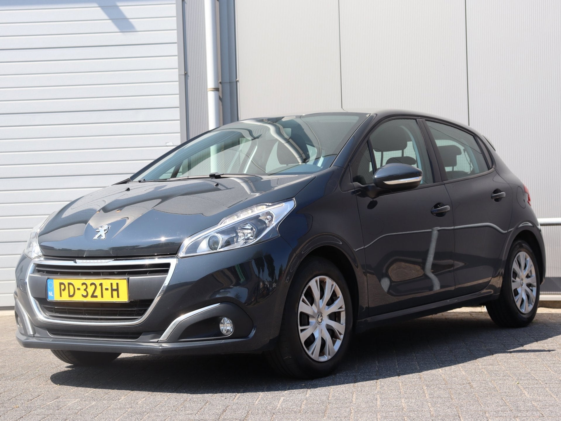 Foto 7 van Peugeot 208 1.2 PureTech Blue Lion navi airco org NL