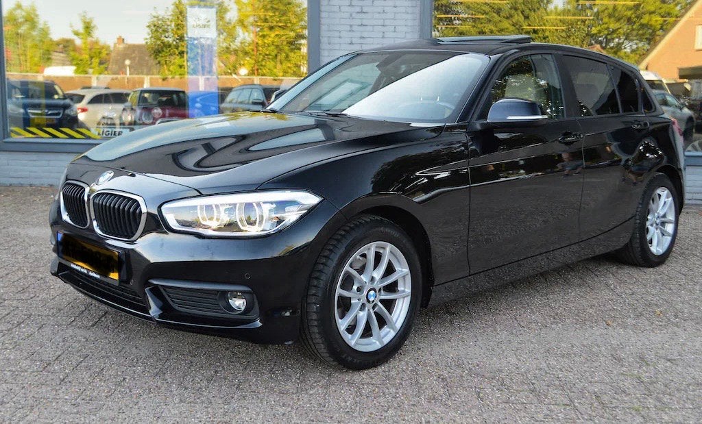 BMW 1-Serie 118i 136pk EDE Aut 2016 Zwart, Auto's, BMW, Zwart, Origineel Nederlands, 650 kg, Particulier