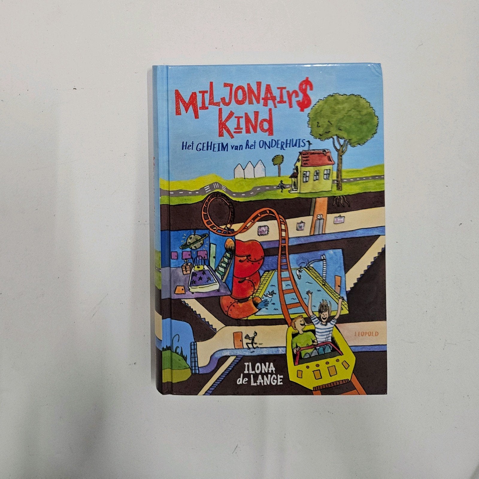 Ilona de Lange - Miljonairskind, Boeken, Ophalen of Verzenden, Zo goed als nieuw, Ilona de Lange