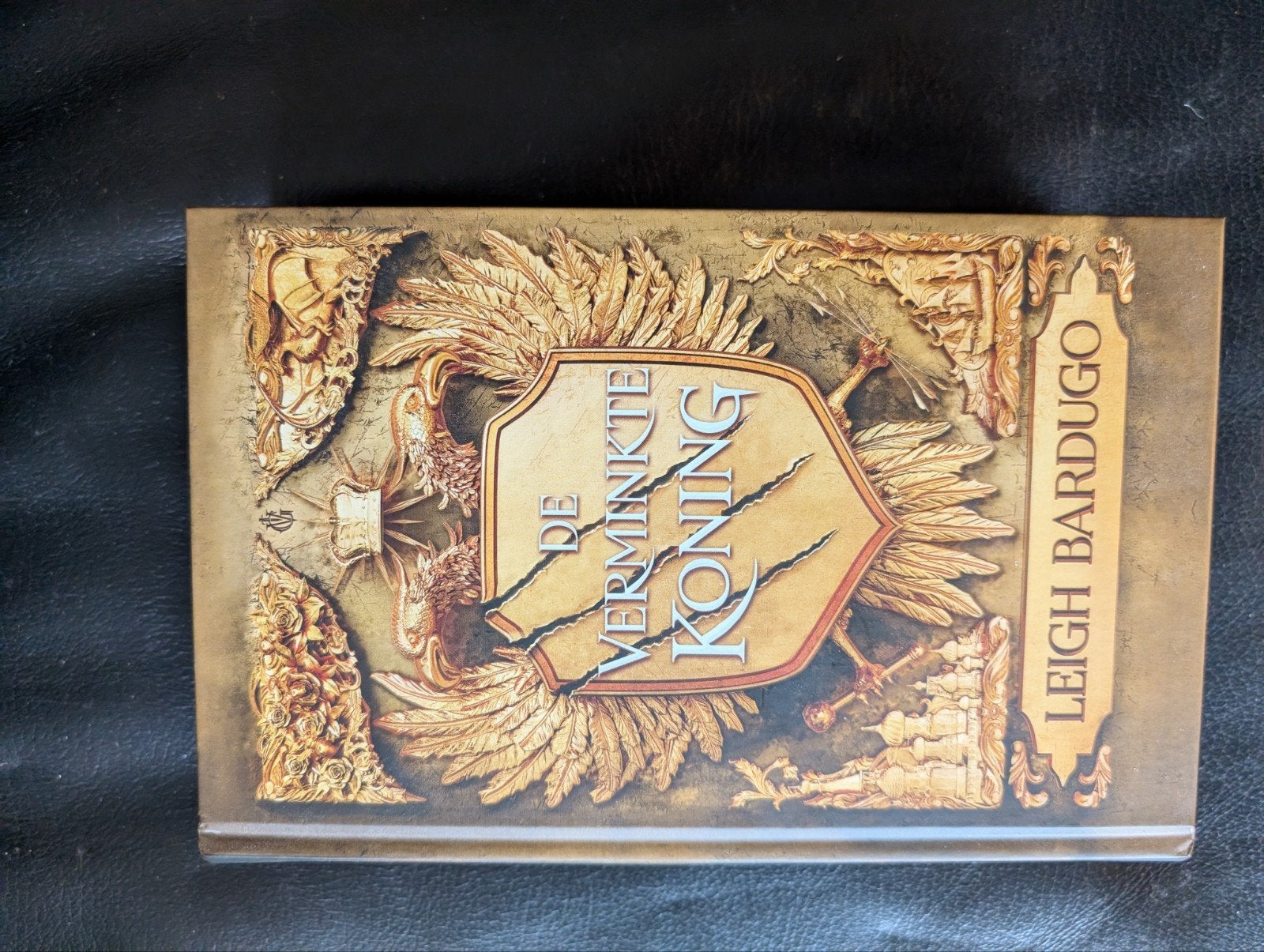De Verminkte Koning - Leigh Bardugo (Hardcover), Ophalen of Verzenden, Zo goed als nieuw, Leigh Bardugo