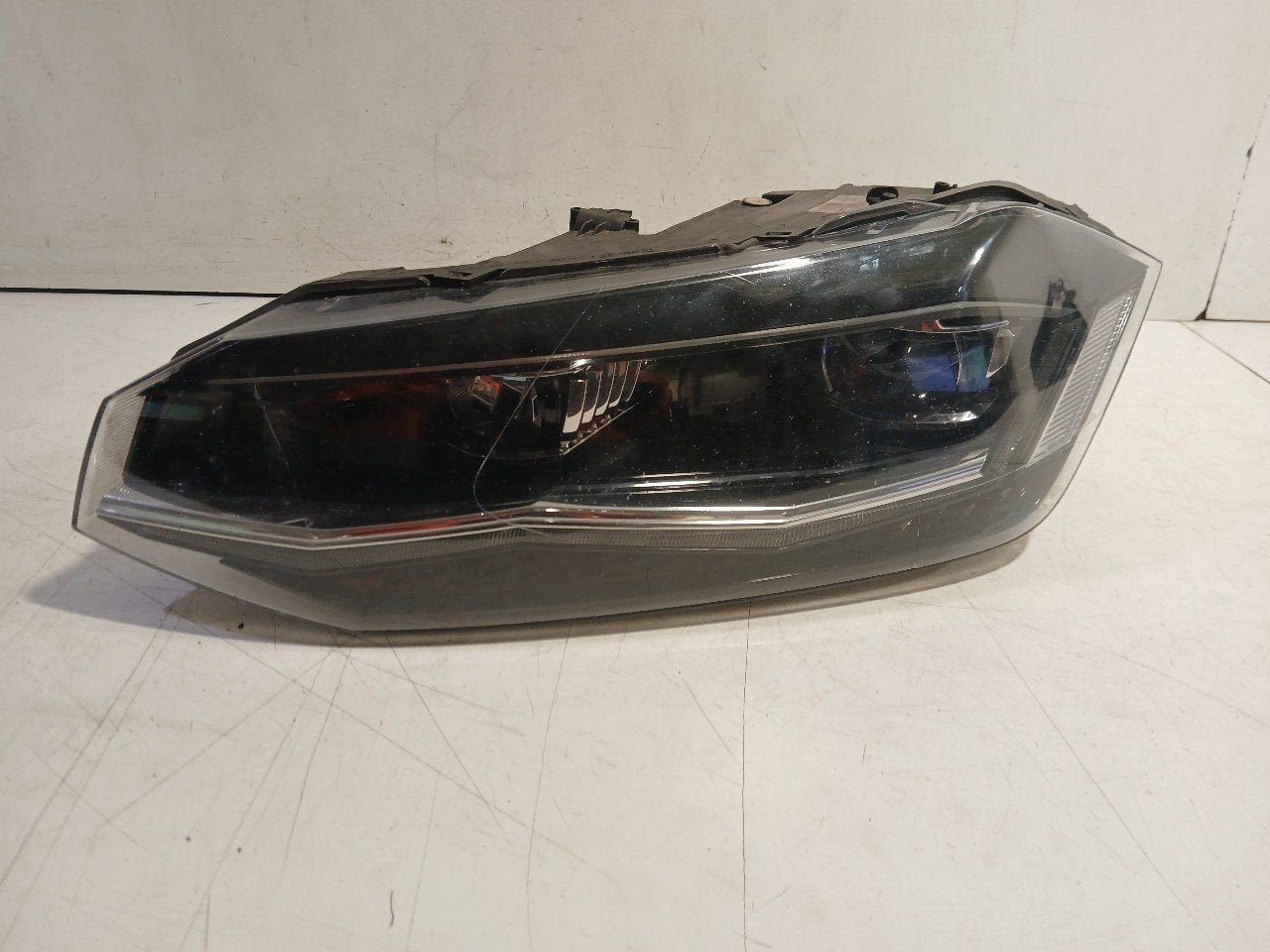 Koplamp links Volkswagen Polo, Onderdelen@venauto.nl, Van der Ven Autorecycling B.V., Gebruikt, Ettenseweg 76, 4706 PB Roosendaal, The Netherlands