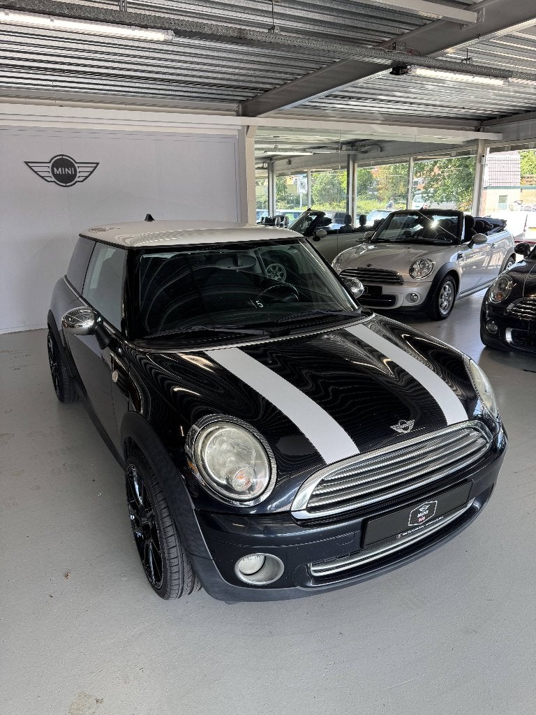 Mini 1.6 Cooper 2007 Zwart ( 3 MAANDEN GARANTIE ), Auto's, Voorwielaandrijving, Stof, 4 cilinders, 4 stoelen