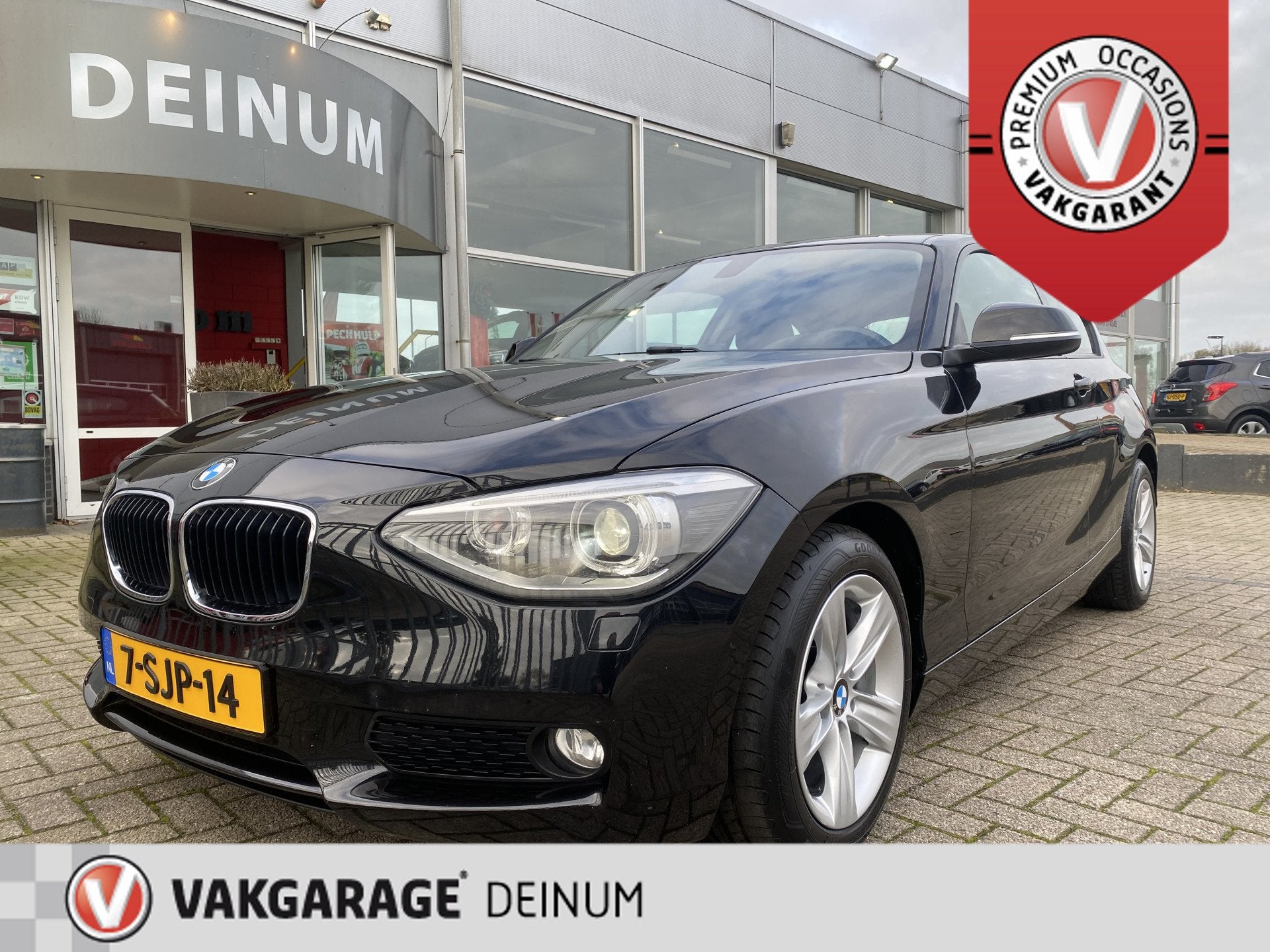 BMW 1-serie 114i EDE Business+ Navigatie, Parkeersens, LMV,, Auto's, Euro 5, Gebruikt, Zwart, 4 cilinders