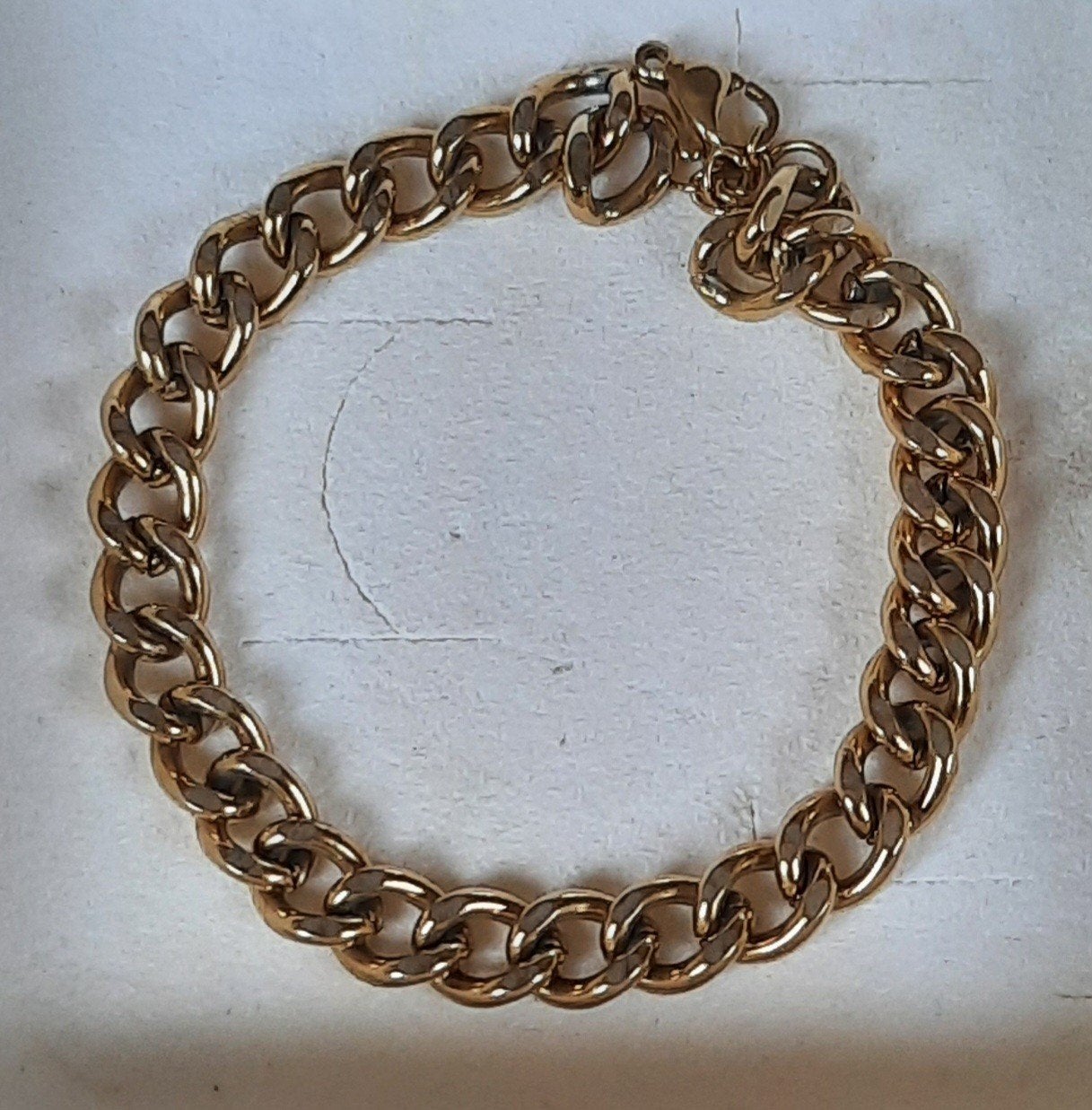 Goudkleurige schakelarmband, Ophalen of Verzenden, Gebruikt, Goud, Overige materialen