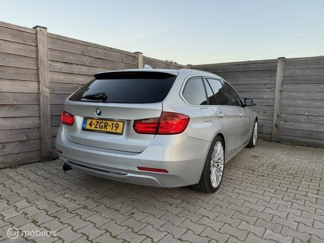 BMW 3-serie Touring 316i M Sport Edition Executive PAno-Stoe, Auto's, Automaat, Gebruikt, 4 cilinders, 1445 kg