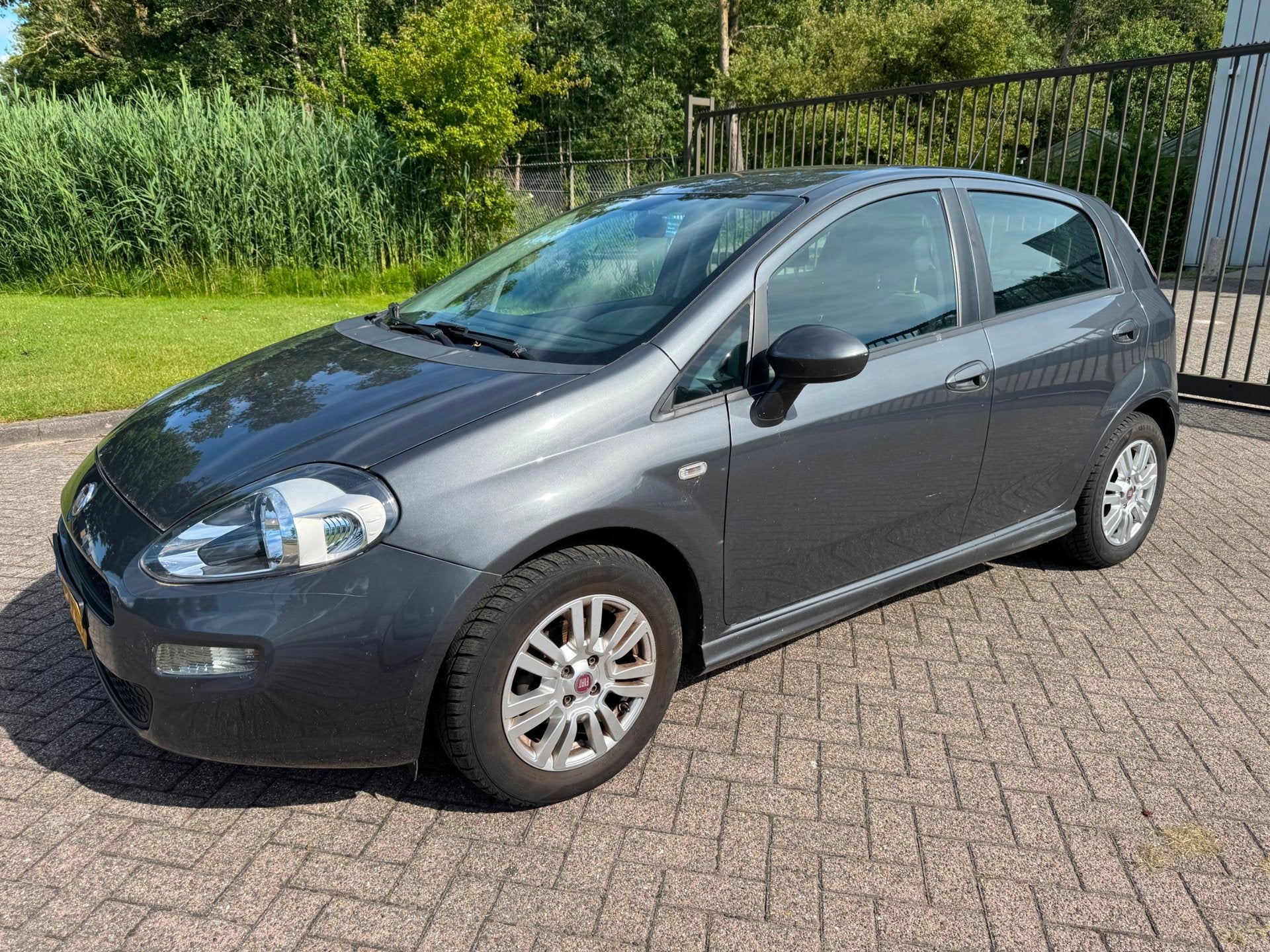 Fiat Punto Evo 0.9 TwinAir Street AIRCO REGENSENSOR ELEKTRIS, Auto's, Voorwielaandrijving, Gebruikt, Euro 6, 49 €/maand